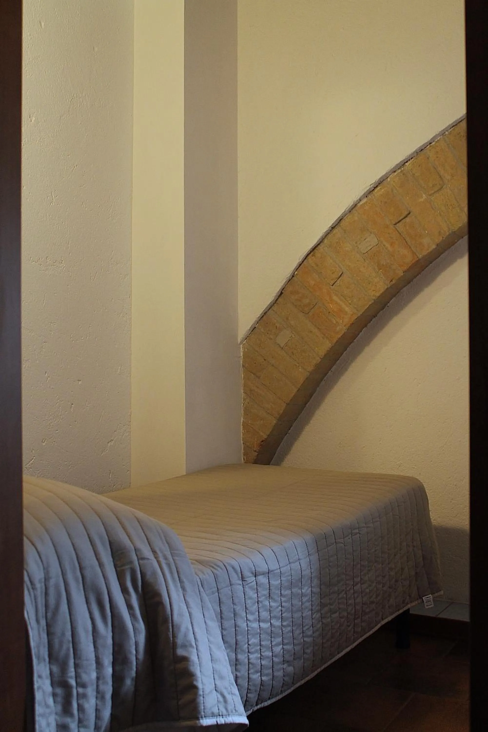 Bed in Alter Ego b&b Assisi
