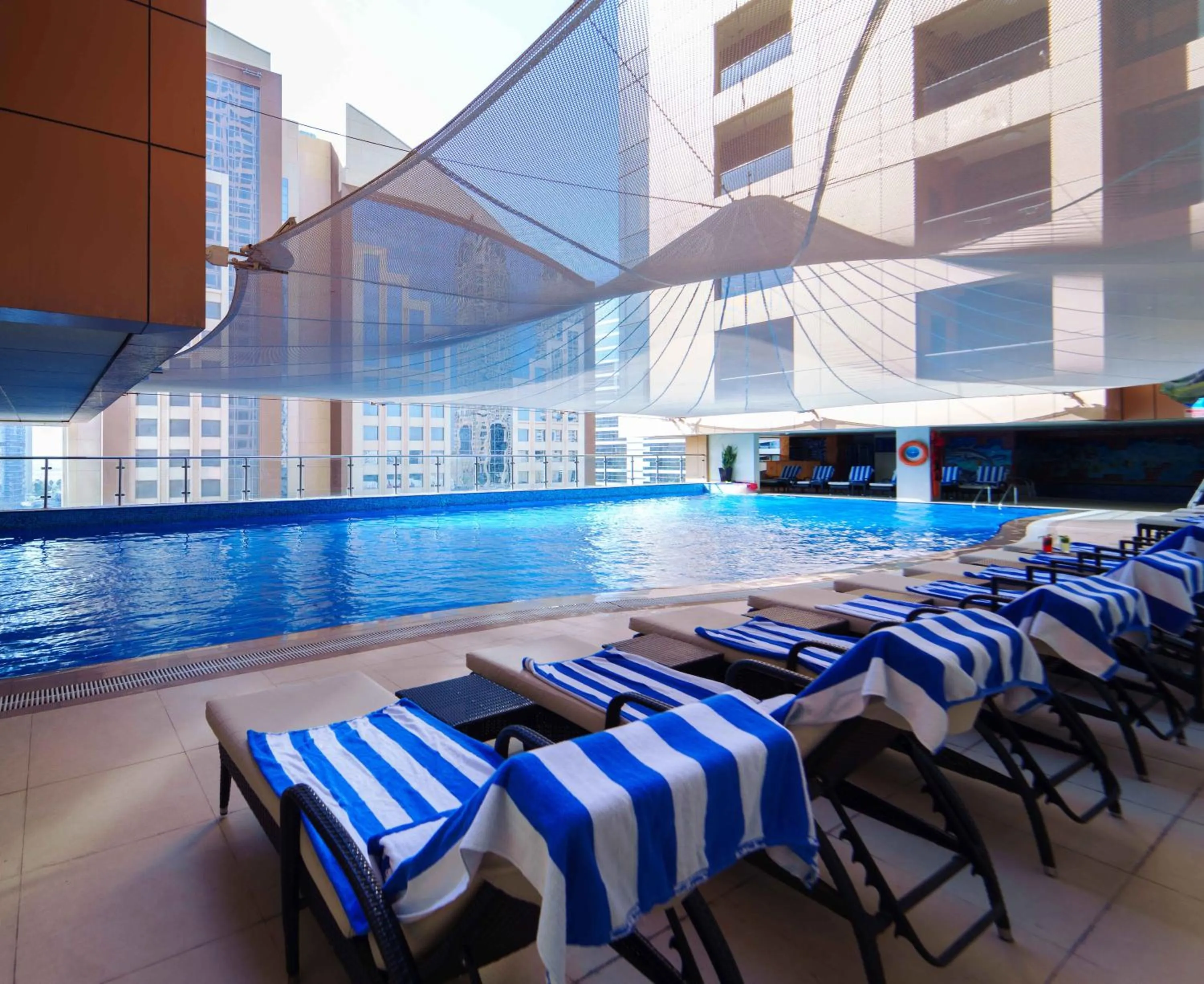 Swimming pool in Mercure Dubai Barsha Heights Hotel Suites And Apartments