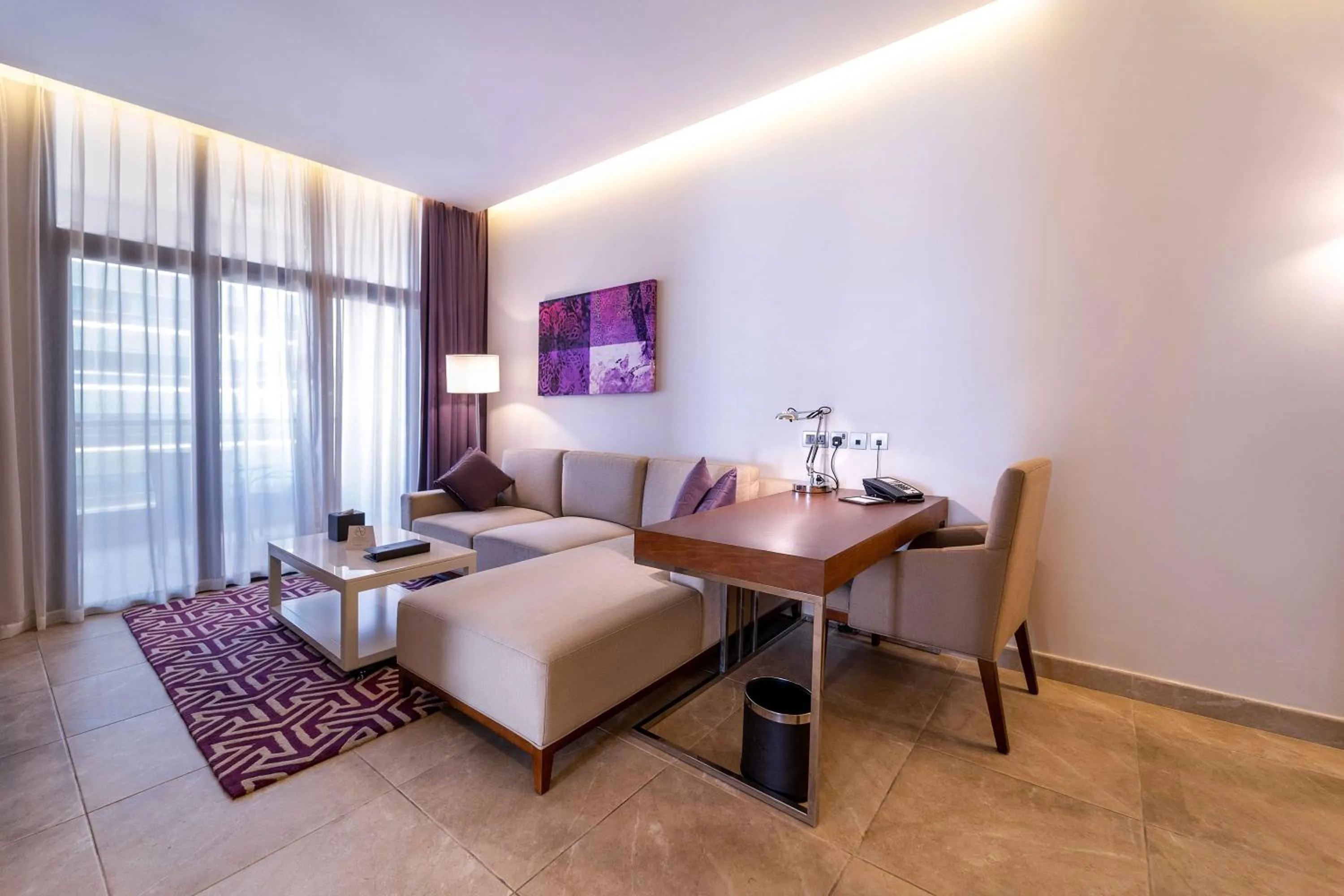 Living room, Bed in Mercure Dubai Barsha Heights Hotel Suites And Apartments