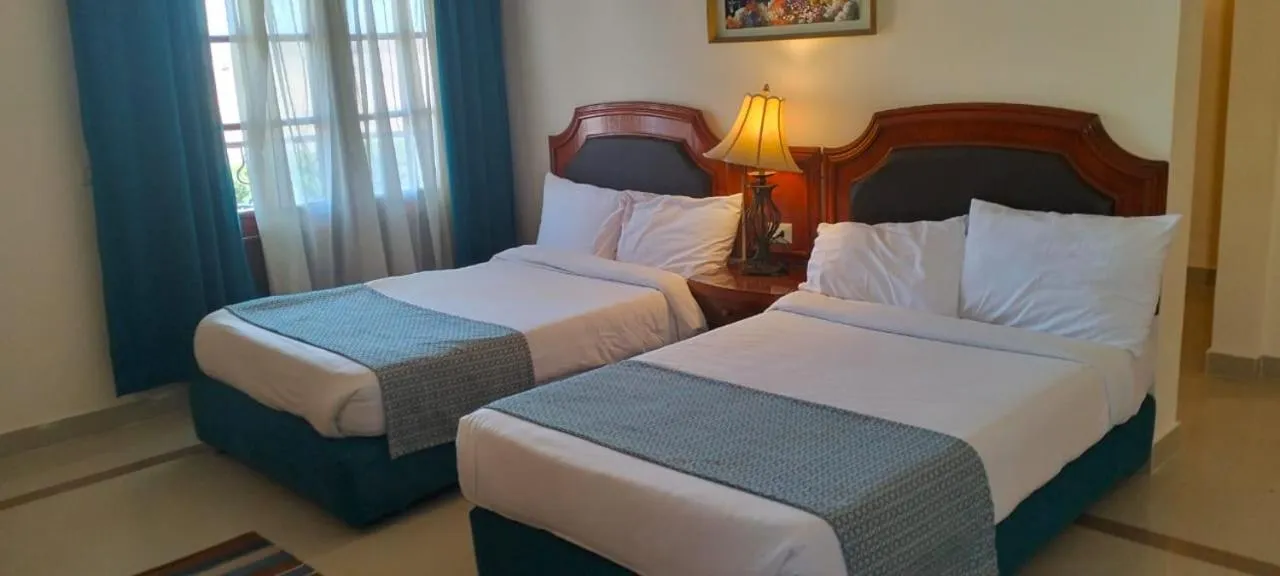 Bed in Coral Hills Resort & SPA
