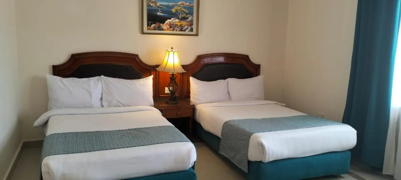 Bed in Coral Hills Resort & SPA