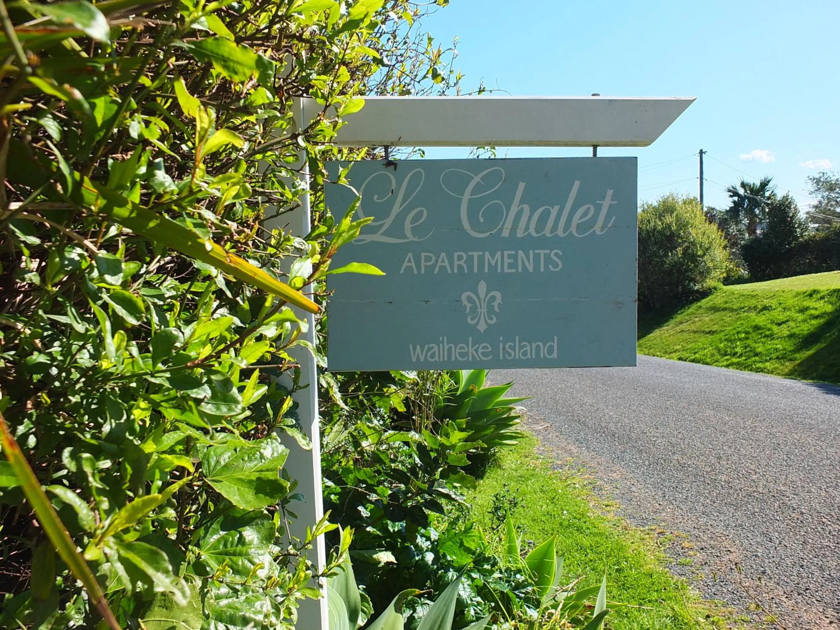 Property logo or sign in Le Chalet Waiheke Apartments