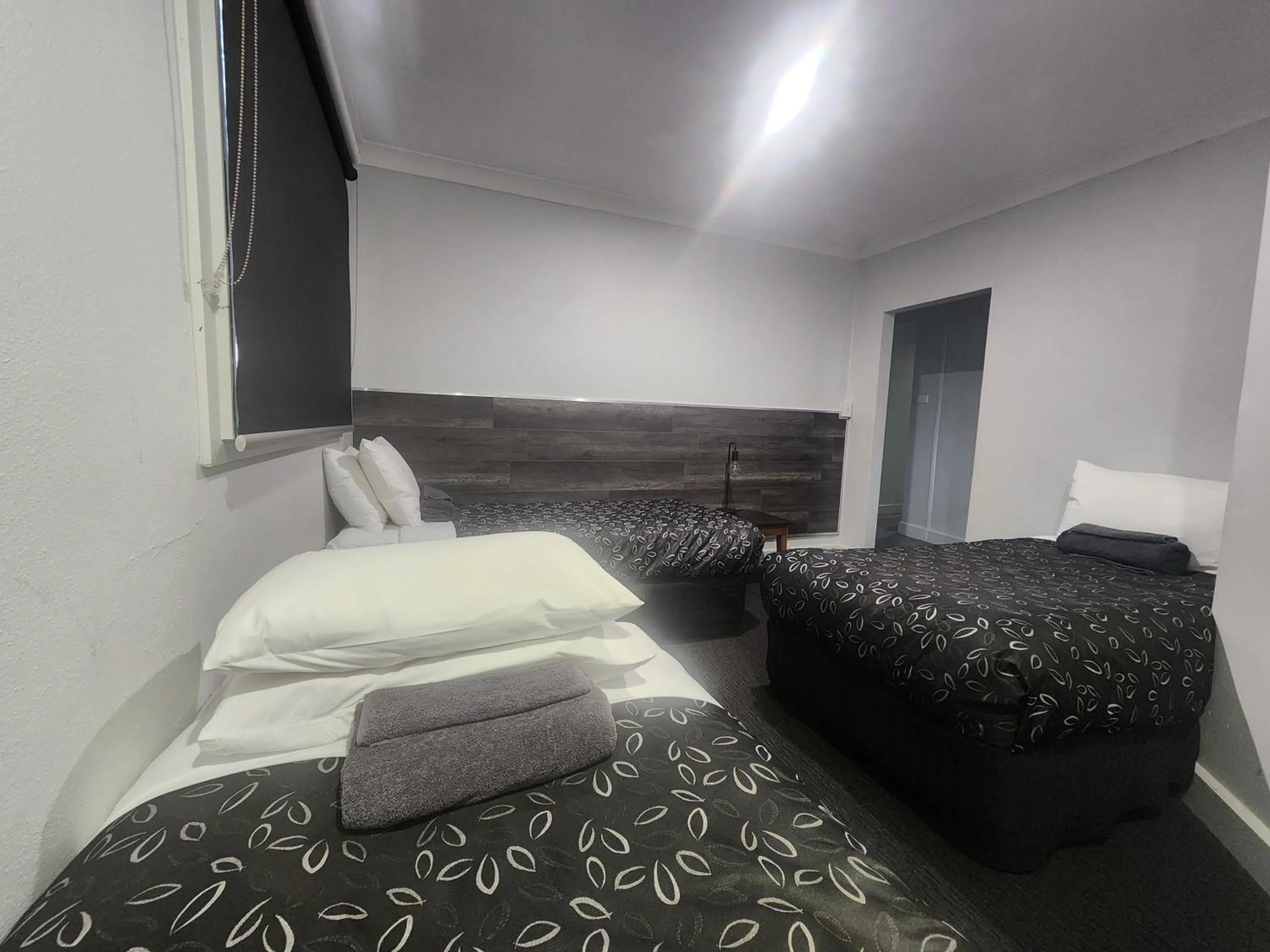 Bed in Motel24Seven and Apartments