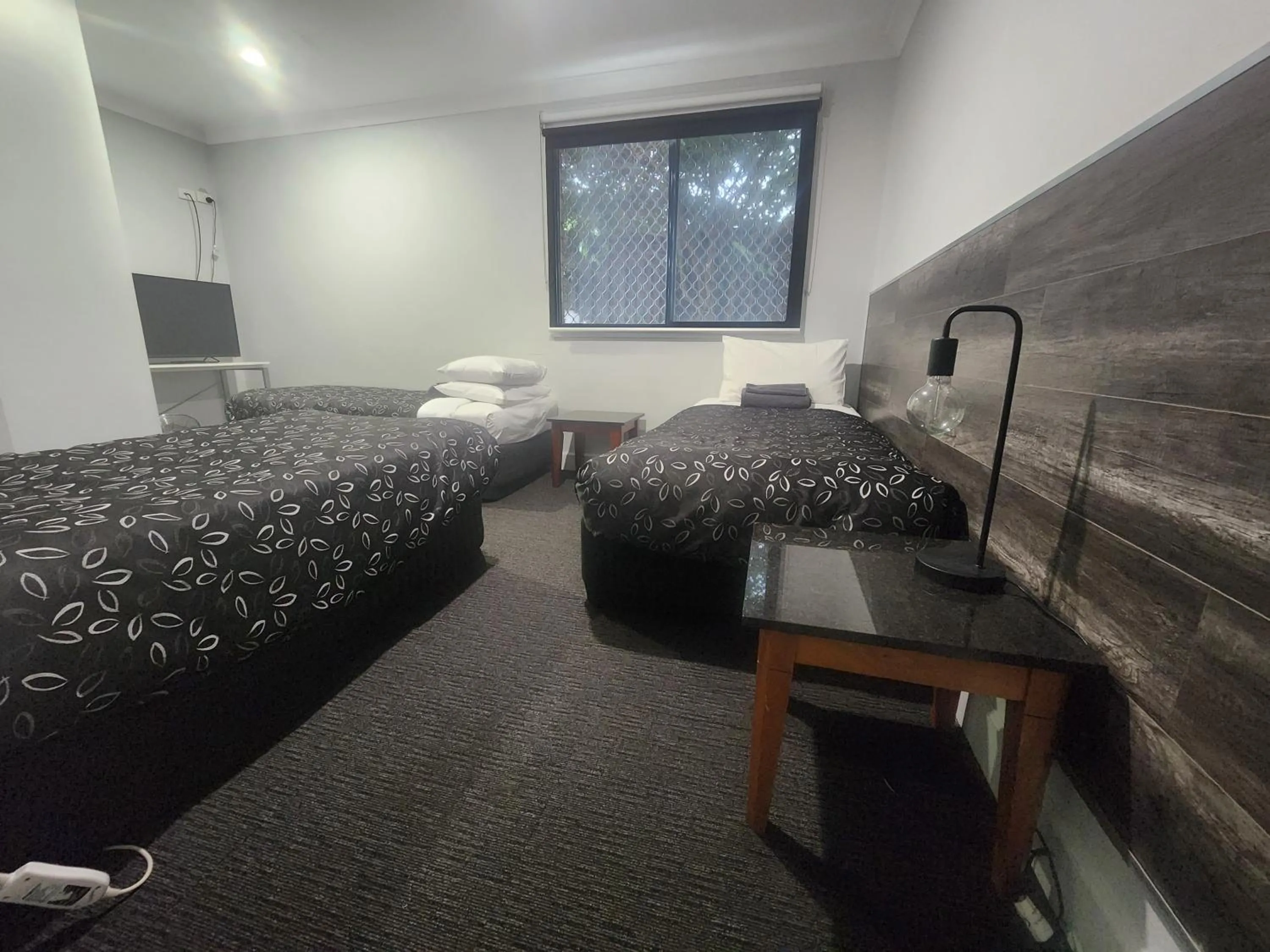 Bed in Motel24Seven and Apartments