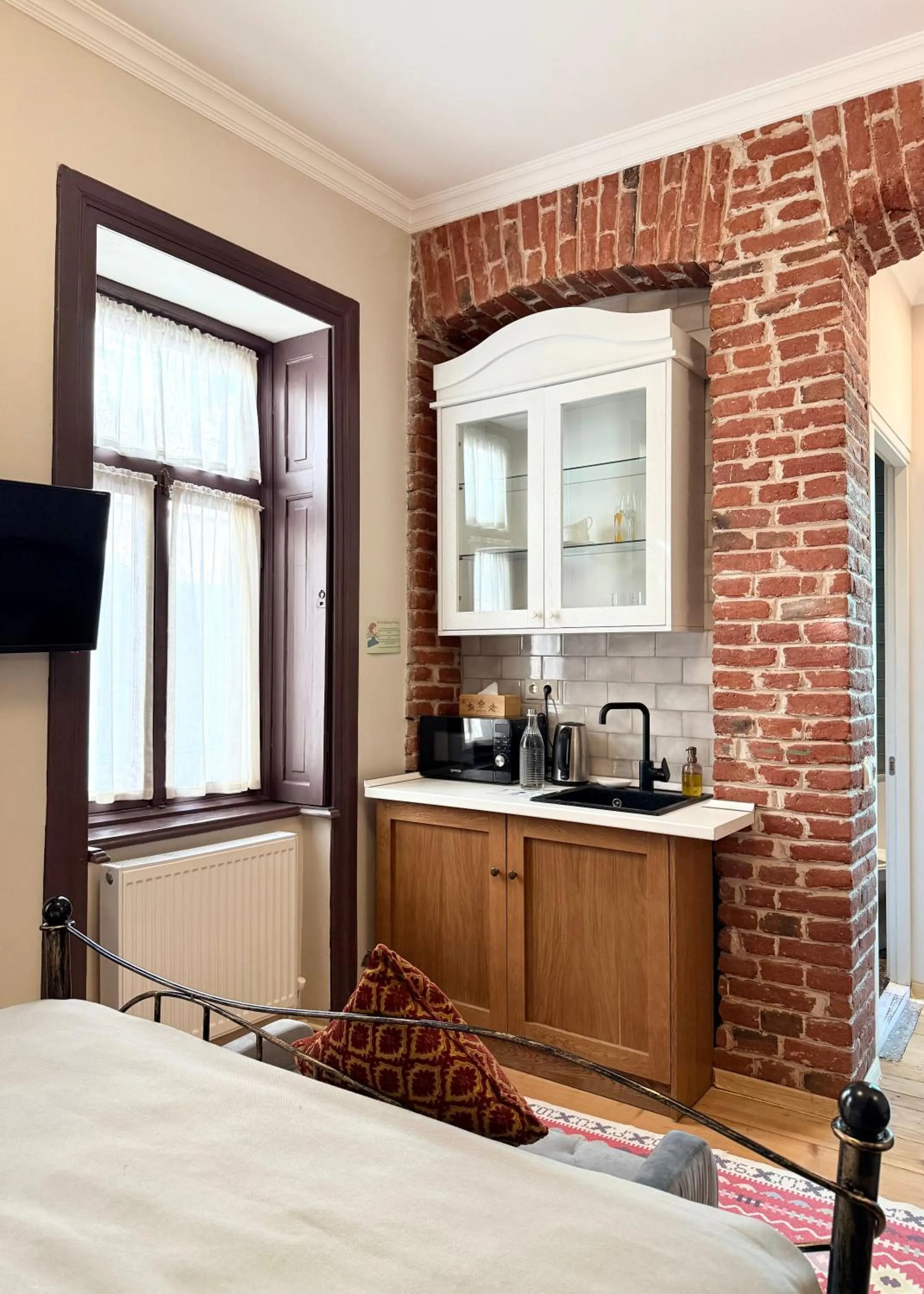 Kitchen or kitchenette, Bed in Arts Hotel Tbilisi