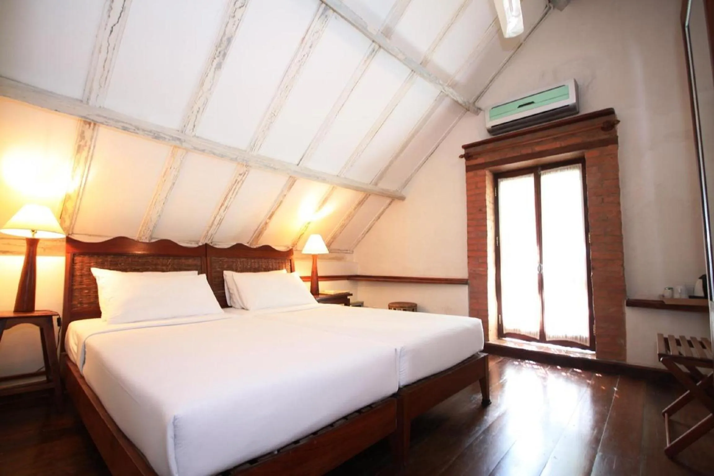 Bed in Sala Prabang Hotel