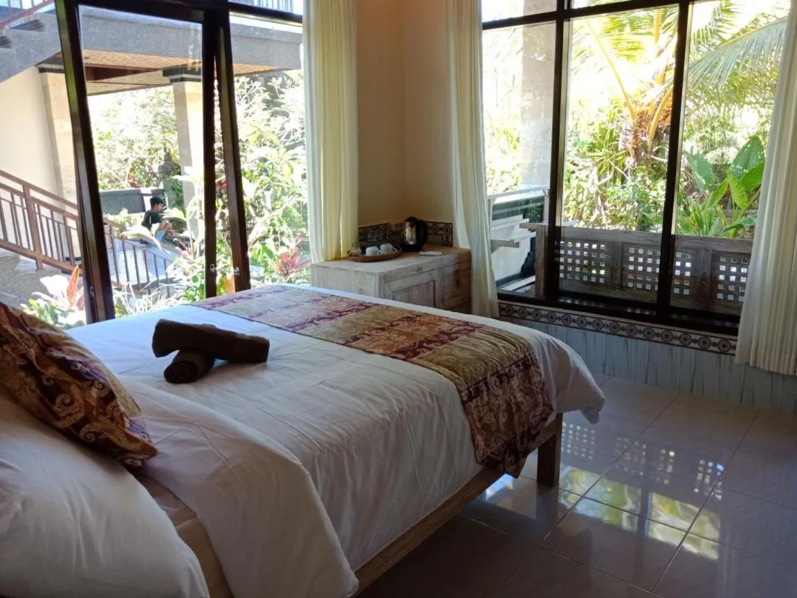 Bed in Bismajaya Bungalow