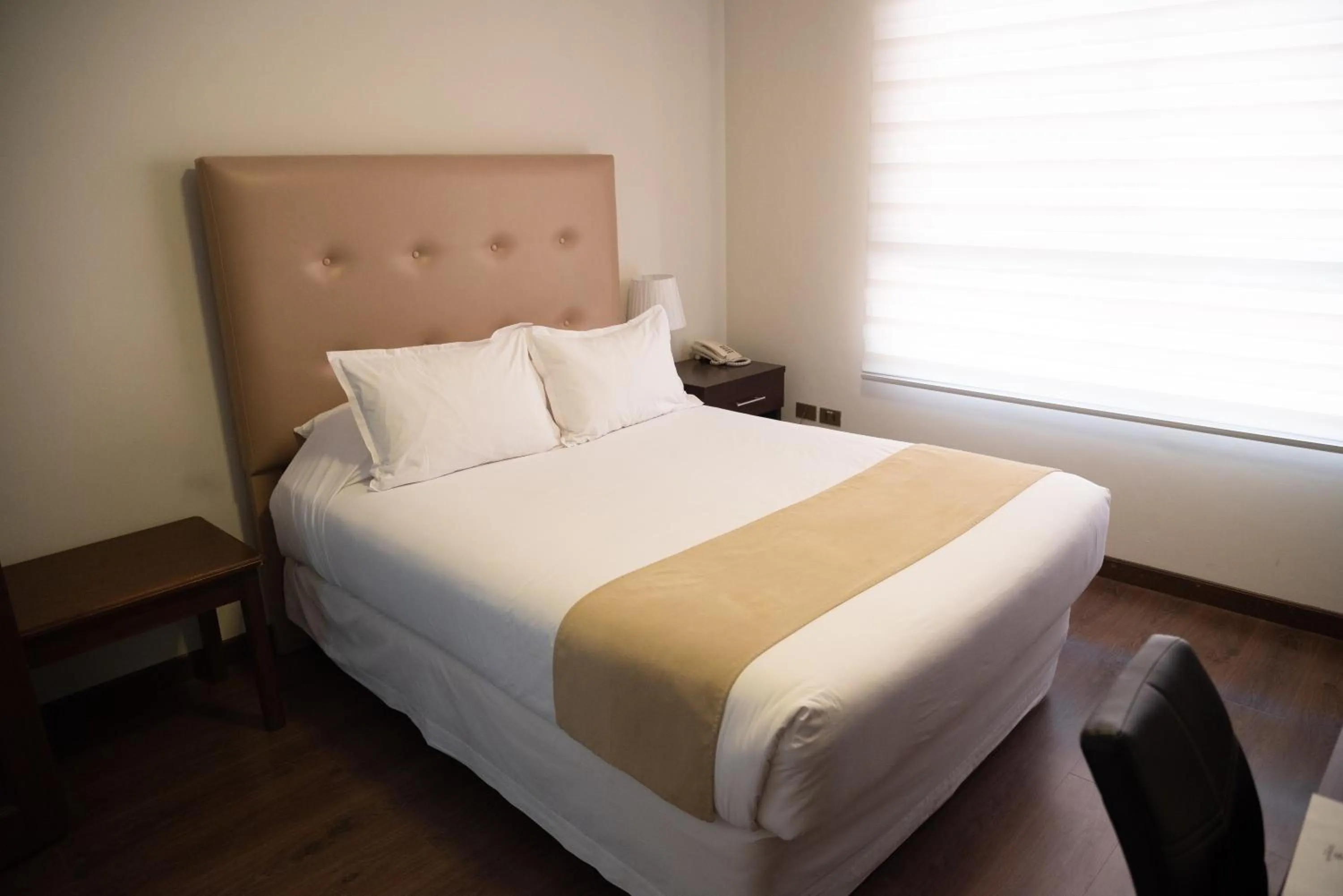 Bed in Domani Hotel Boutique