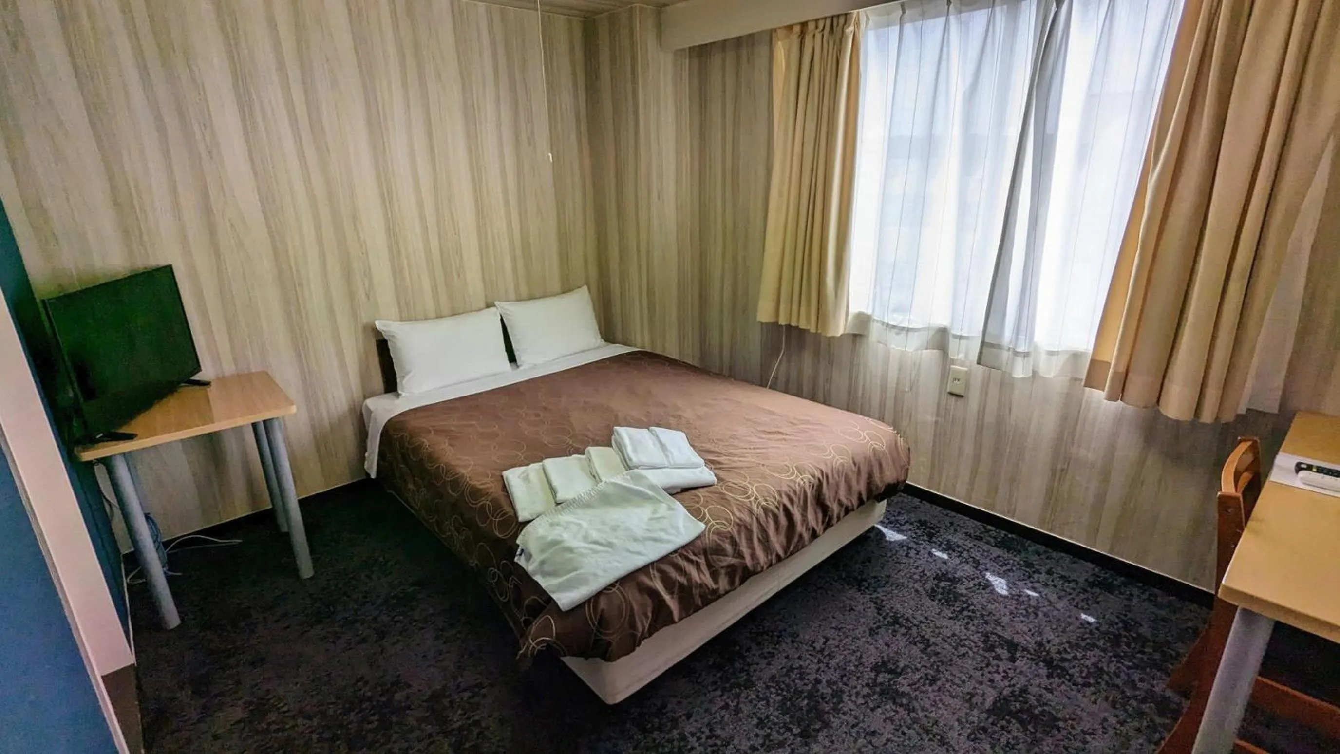 Bed in Select Inn Shimada Ekimae