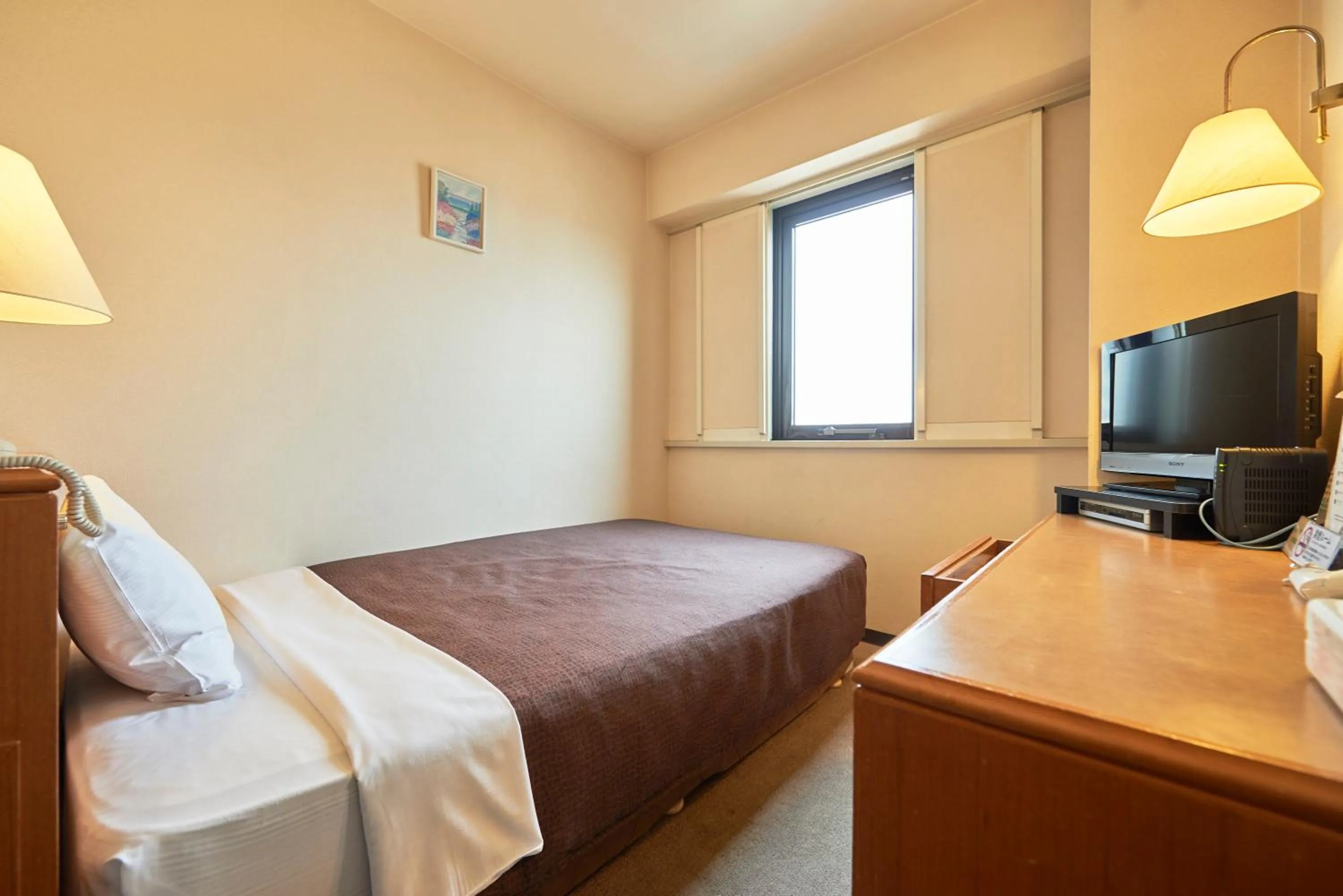 Bed in Hotel Select Inn Hachinohe Chuo