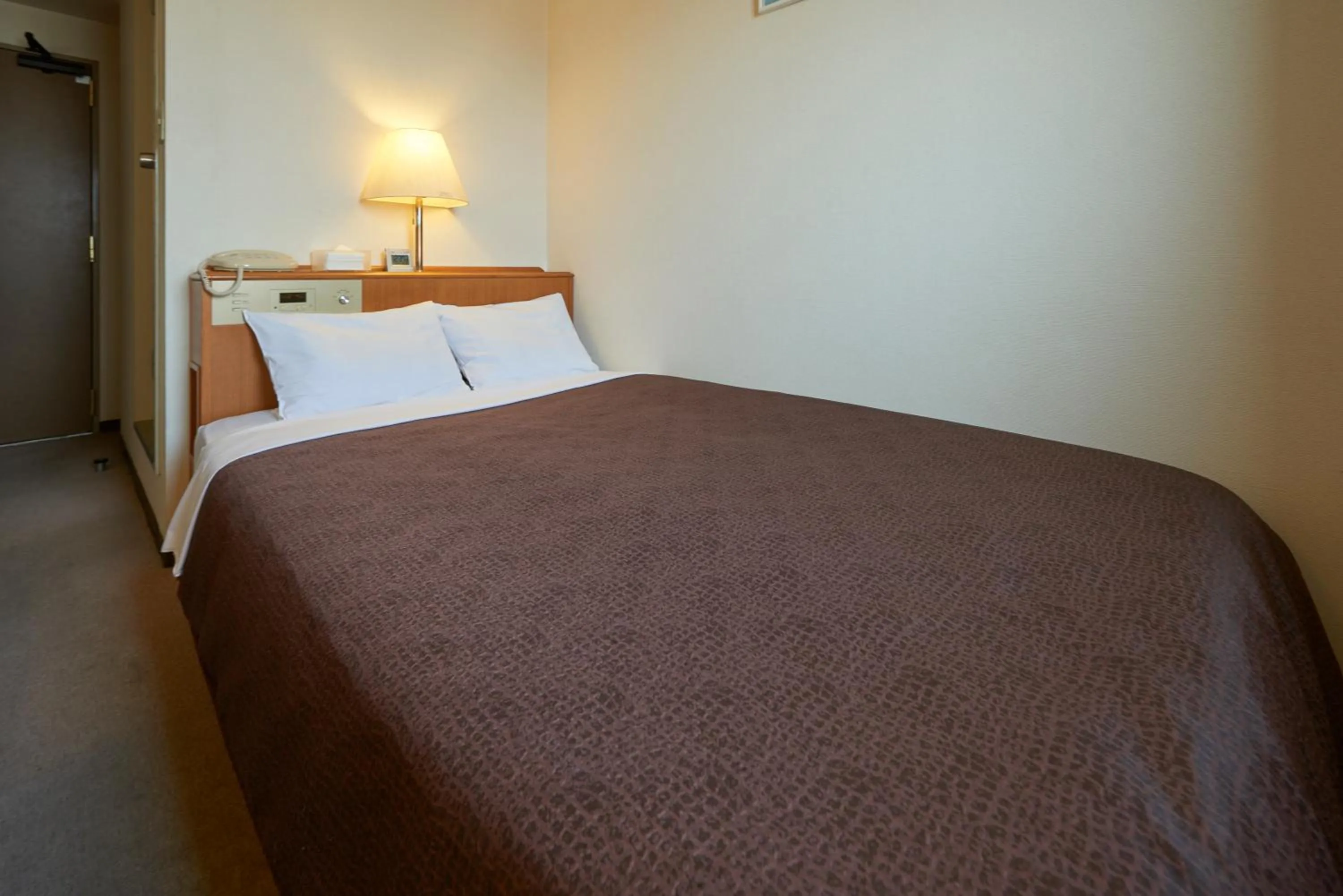 Bed in Hotel Select Inn Hachinohe Chuo