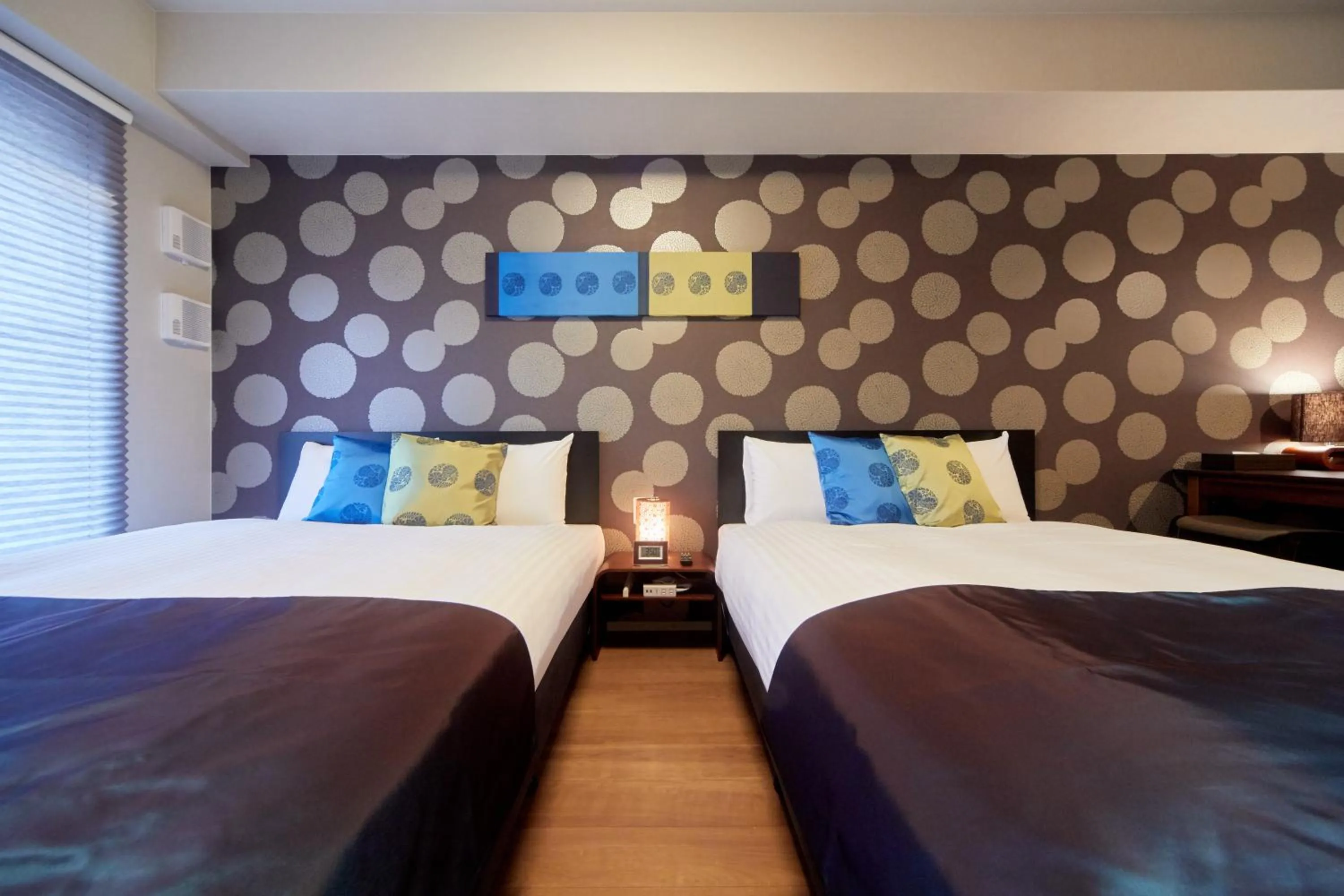 Bed in Hotel Mondonce Kyoto Gojo