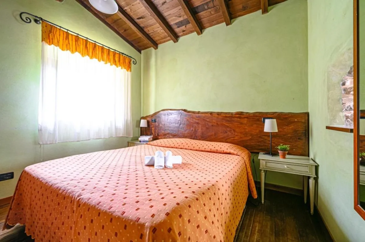 Bed in Agriturismo Pian di Fiume