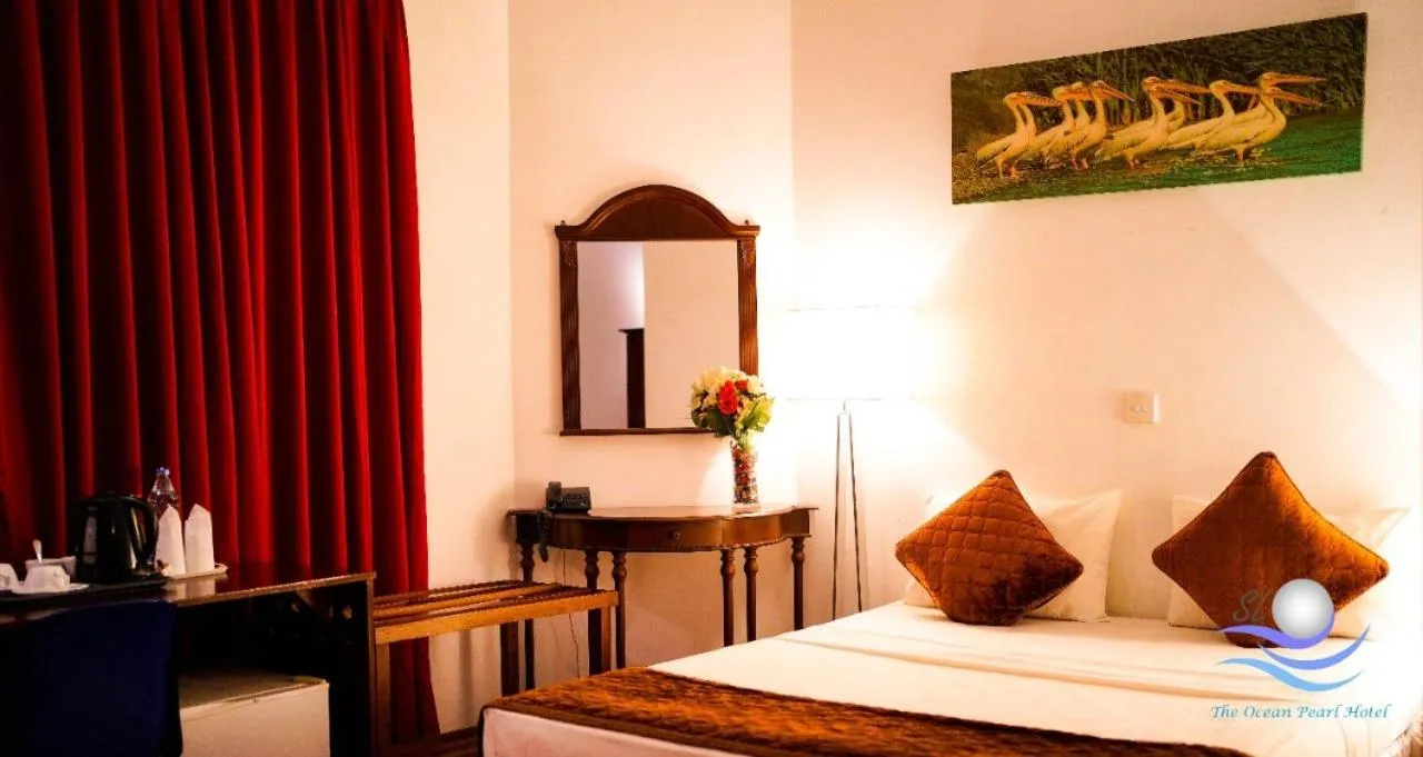 Bed in The Ocean Pearl Hotel Negombo