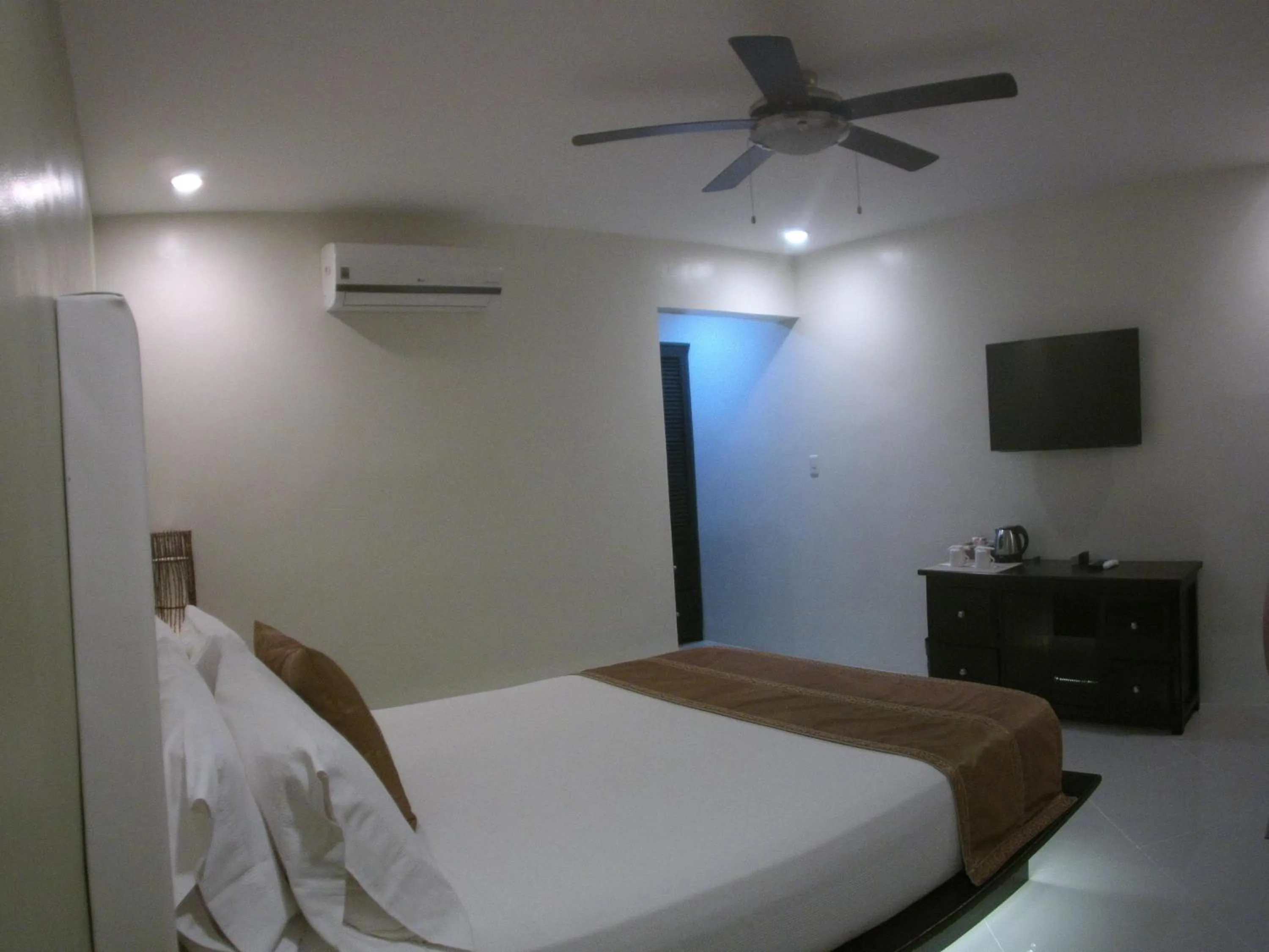 Bed in AJ's Place Beach Resort