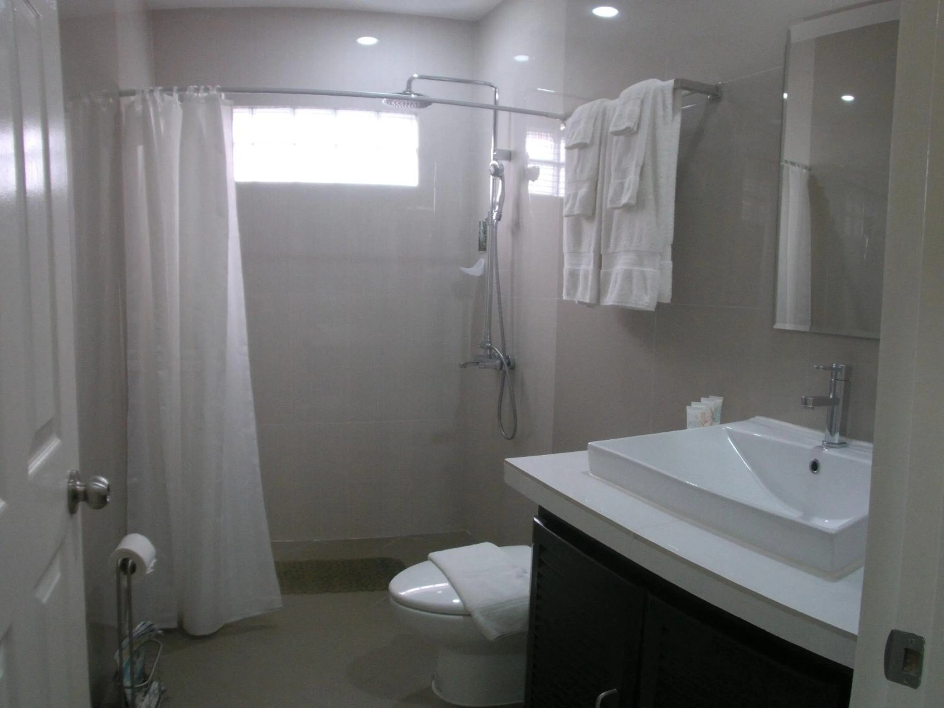 Shower in AJ's Place Beach Resort