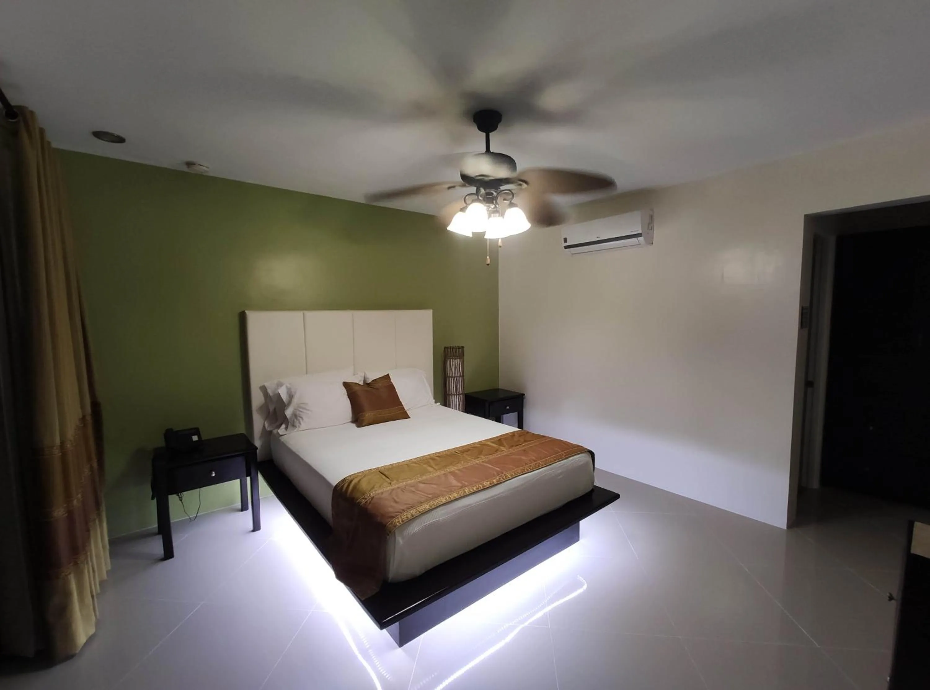 Bed in AJ's Place Beach Resort