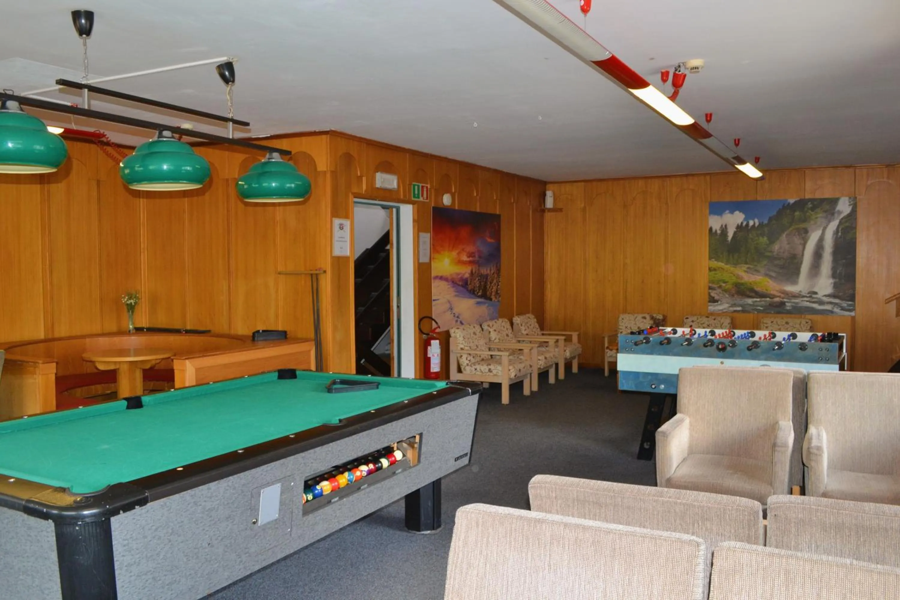 Communal lounge/ TV room in Hotel Teola