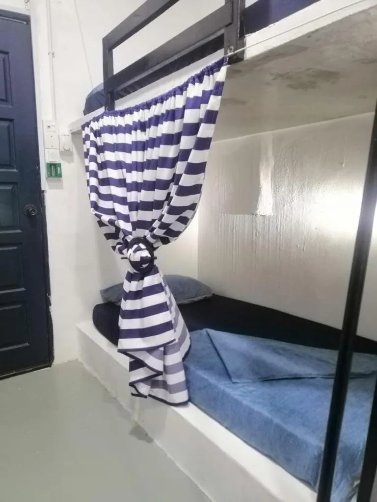 Bed in Rembulan Langkawi Guesthouse