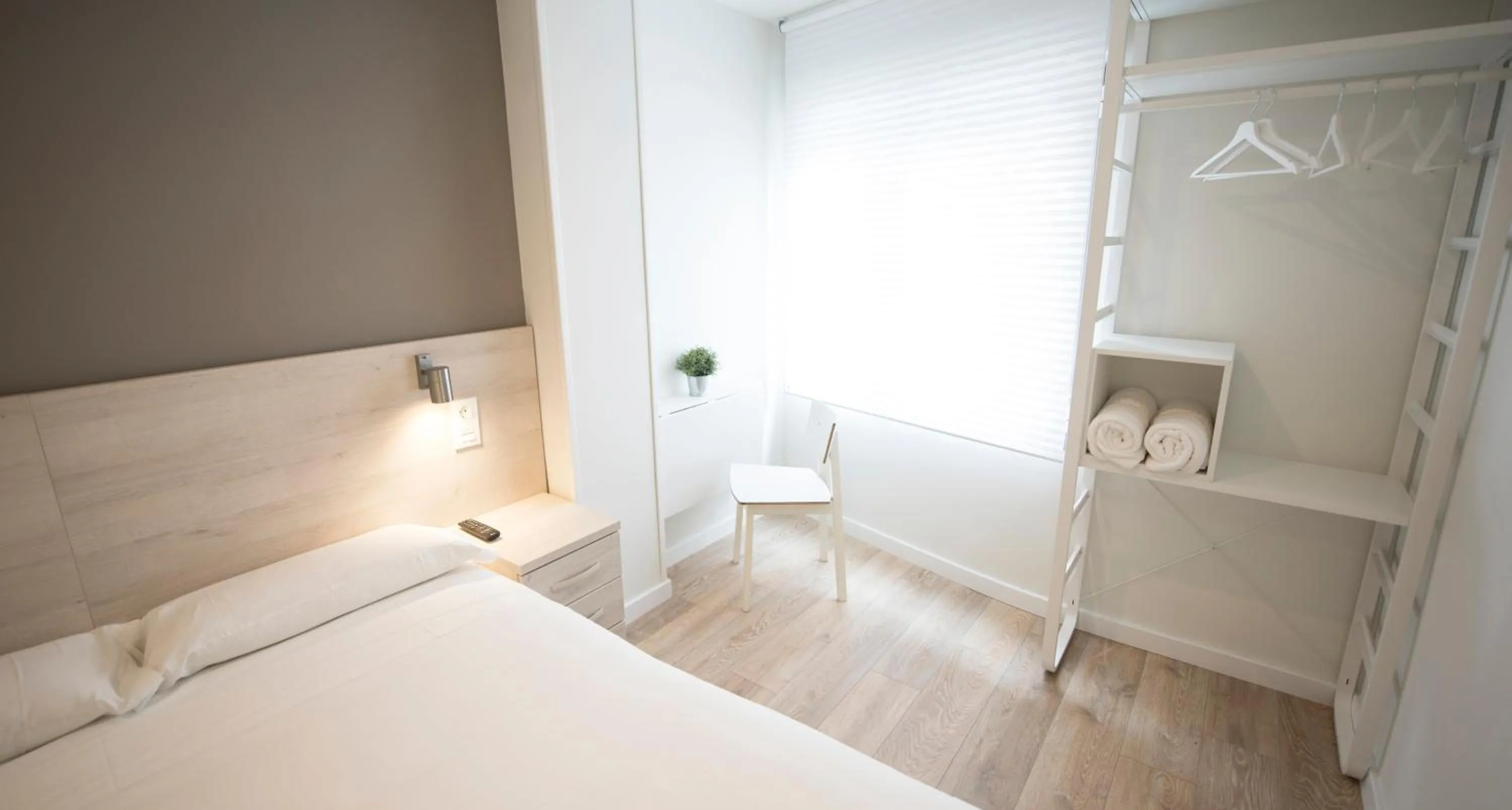 Decorative detail, Bed in Happy Hostal Carrales