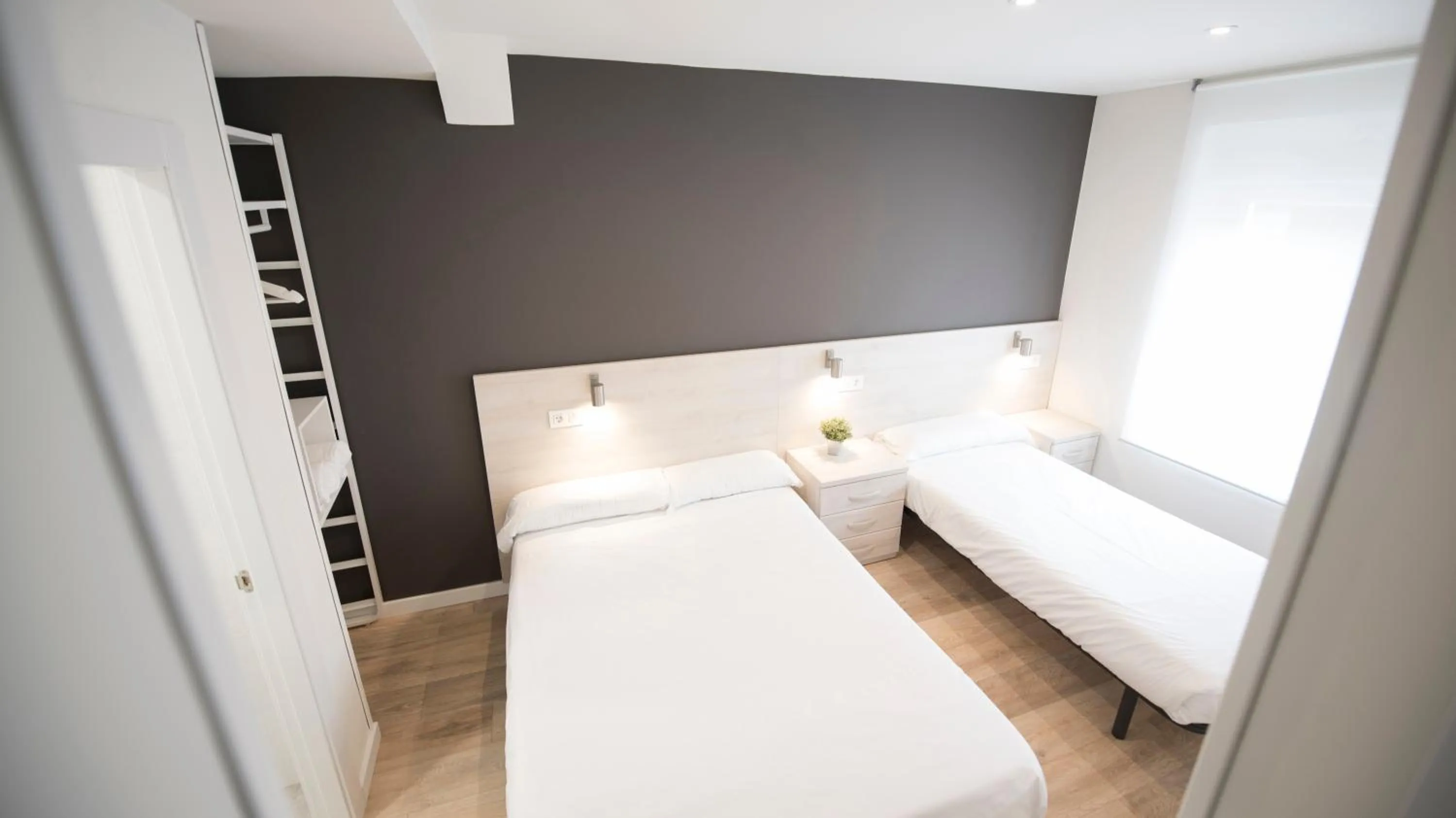 Photo of the whole room, Bed in Happy Hostal Carrales