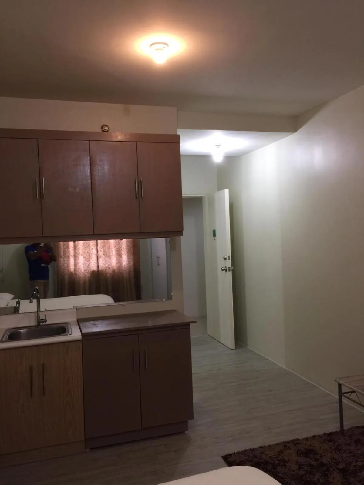 Kitchen or kitchenette in Staycation condo with pool near SM Tungko, Bulacan