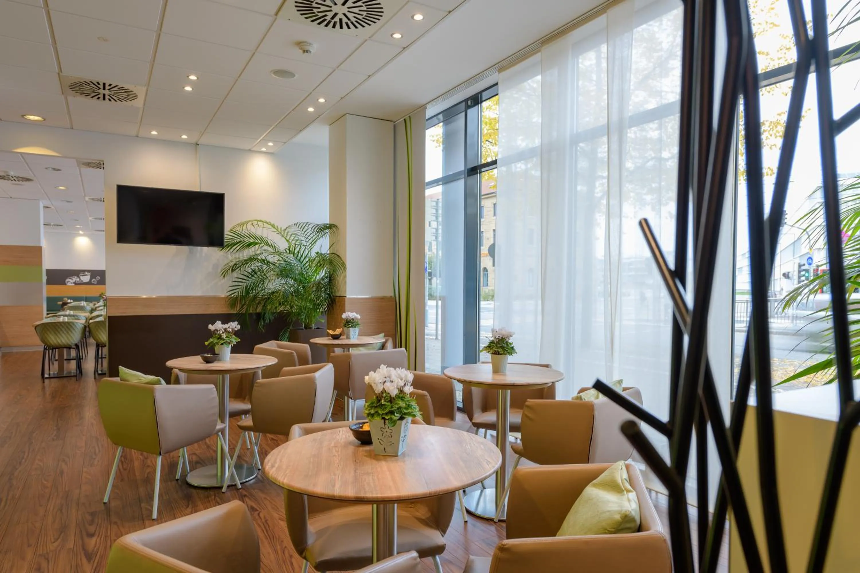 Communal lounge/ TV room in ibis Heilbronn City