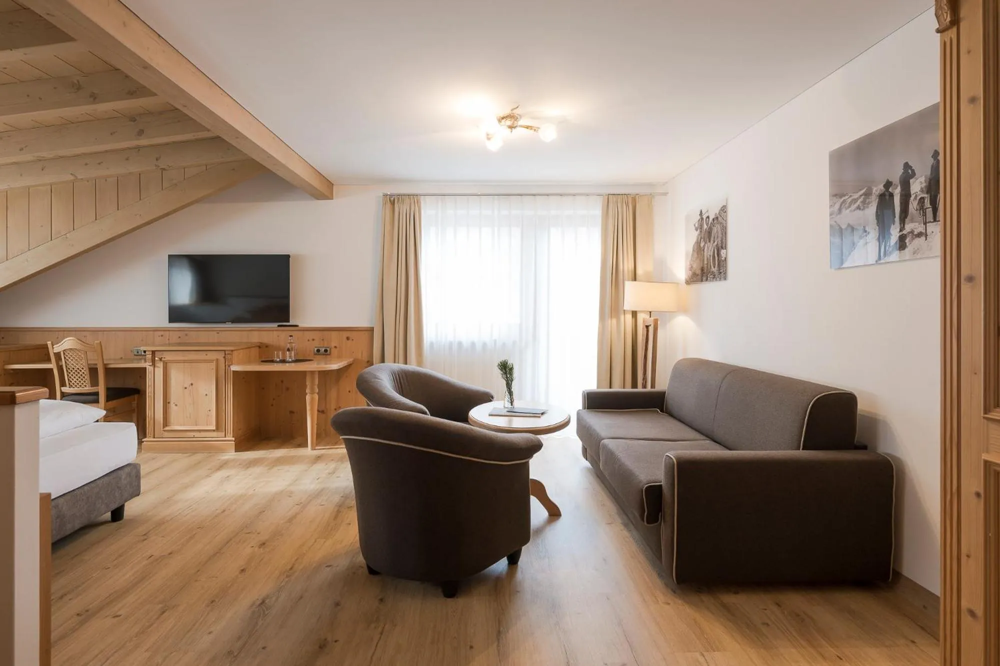 Communal lounge/ TV room in Hotel Lärchenhof