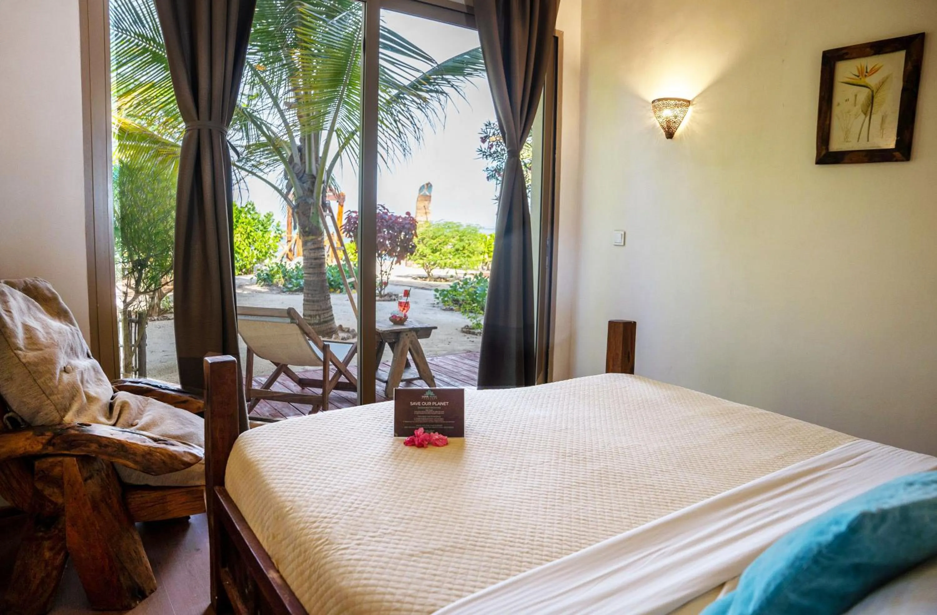 Bed in Clove Island Villas & Spa