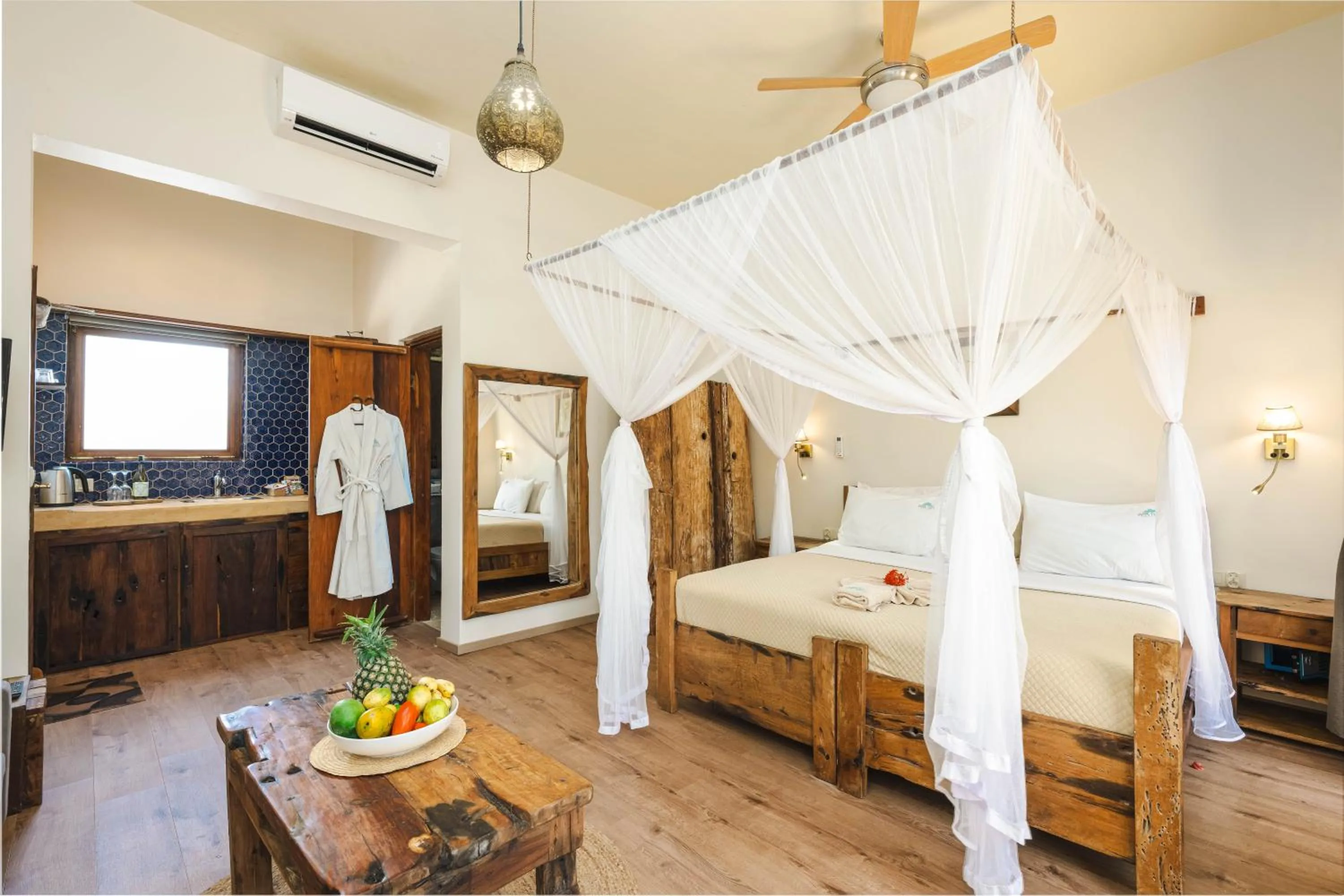 Bed in Clove Island Villas & Spa