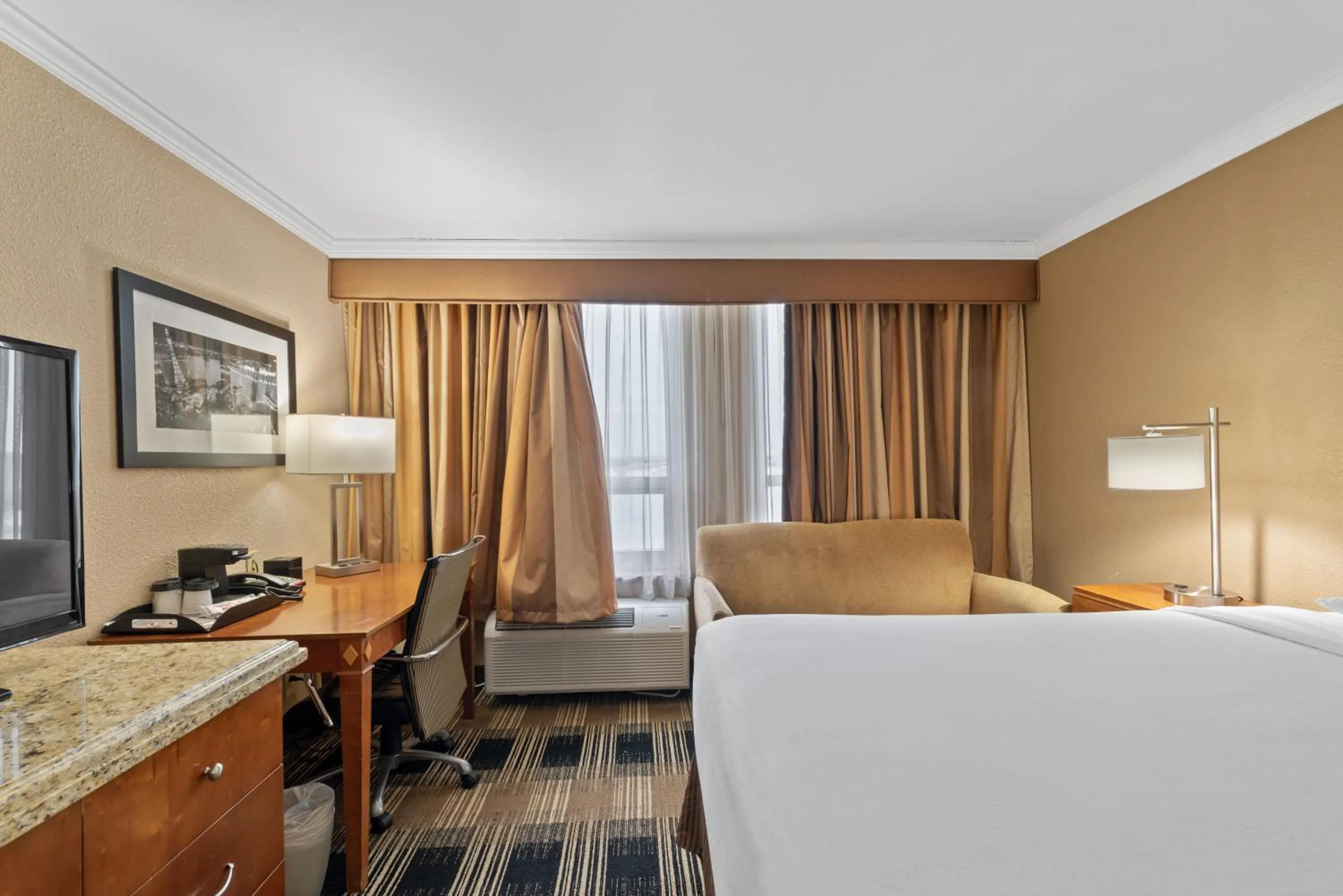 Bed in Hotel Executive Suites