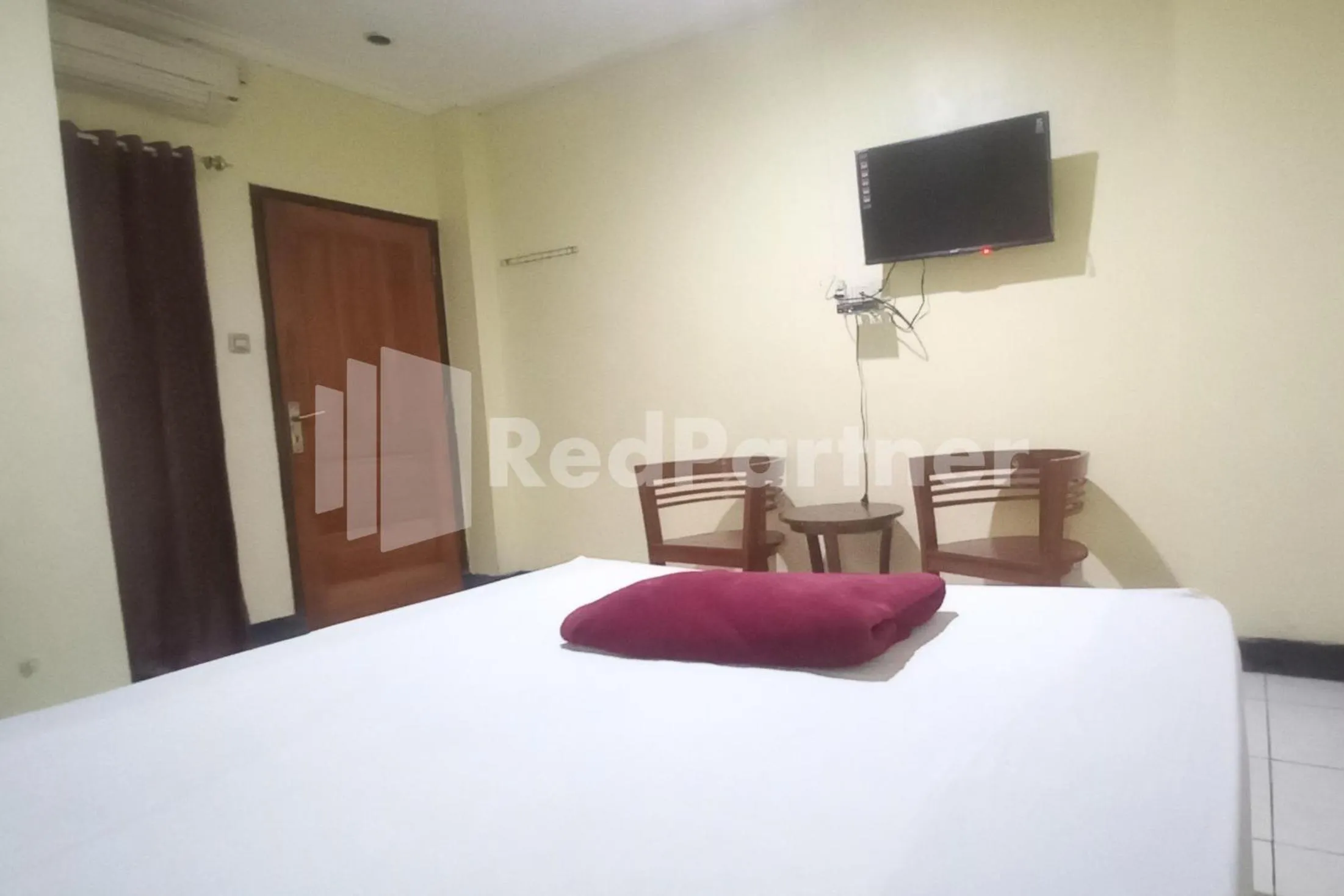 Bedroom, Bed in Hotel Palem 2 Syariah Malang Redpartner