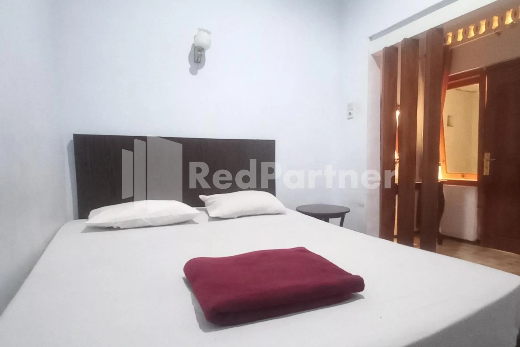 Bedroom, Bed in Hotel Palem 2 Syariah Malang Redpartner