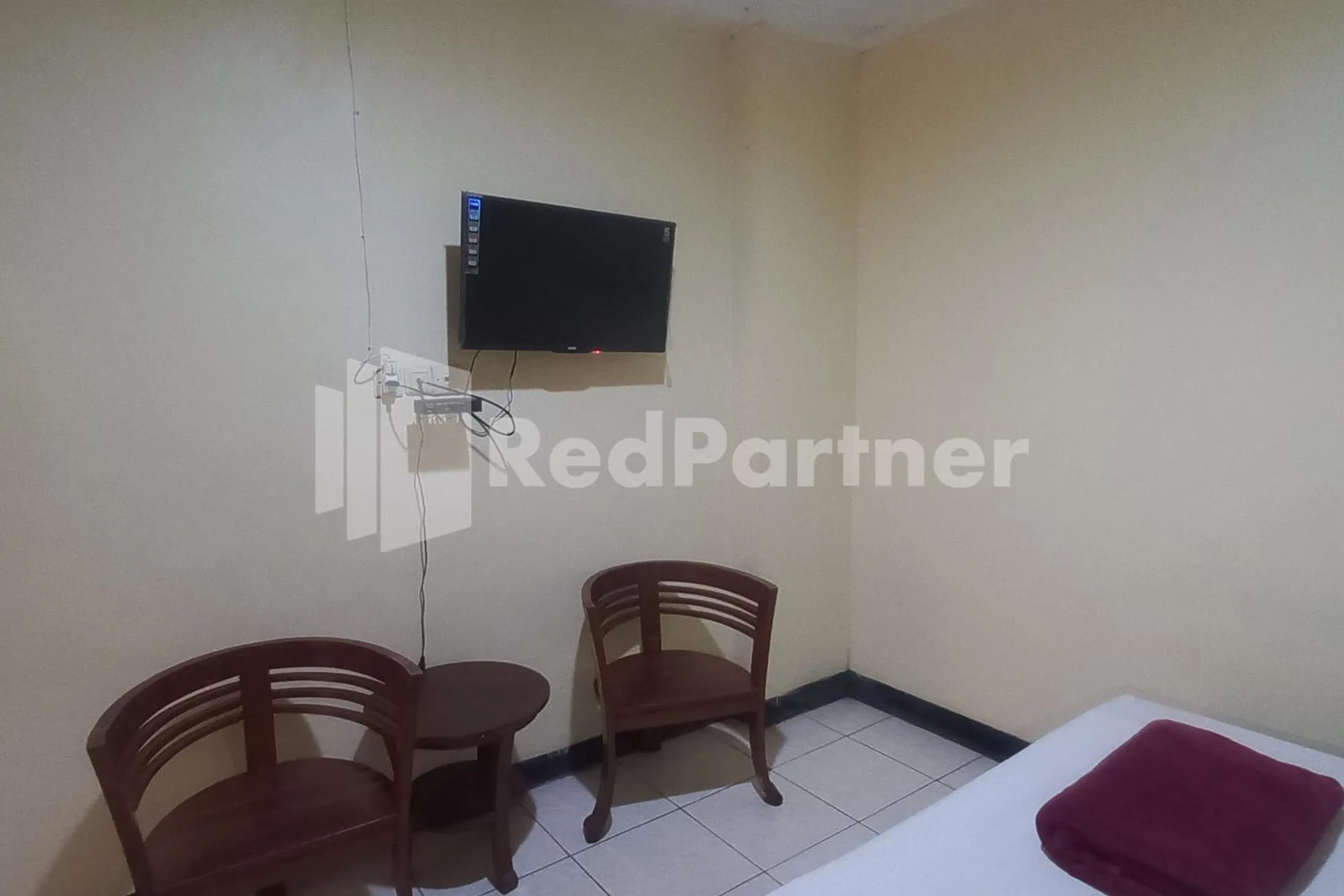 Bedroom, Bed in Hotel Palem 2 Syariah Malang Redpartner