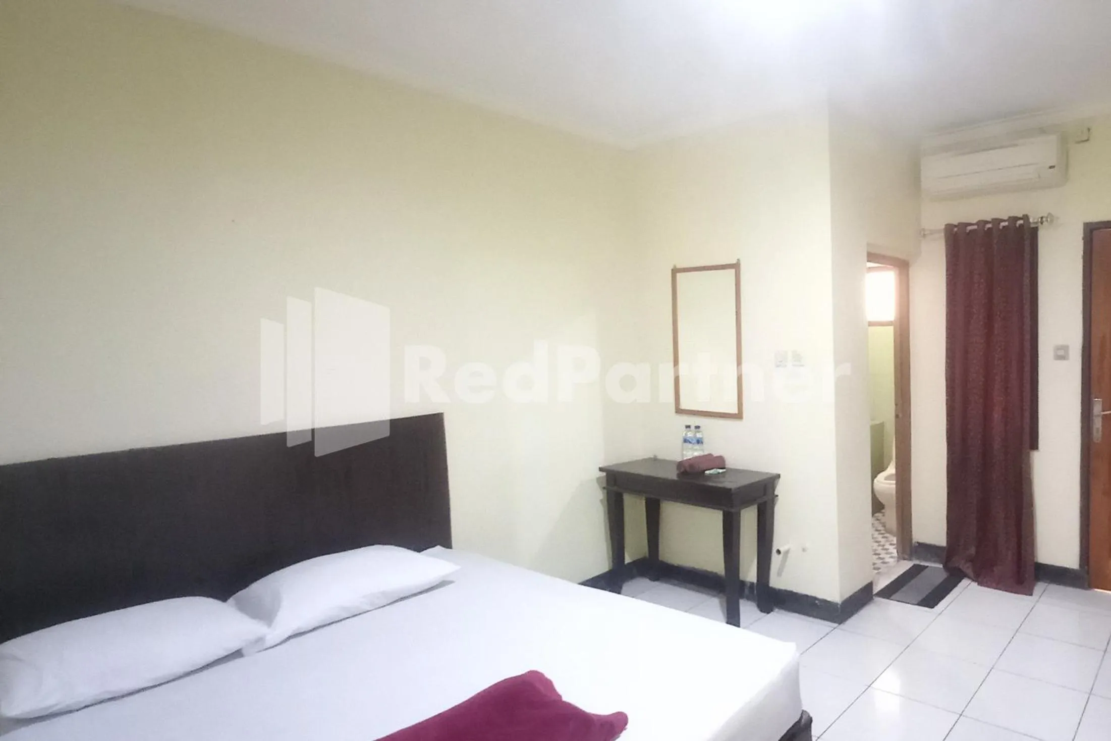 Bedroom, Bed in Hotel Palem 2 Syariah Malang Redpartner