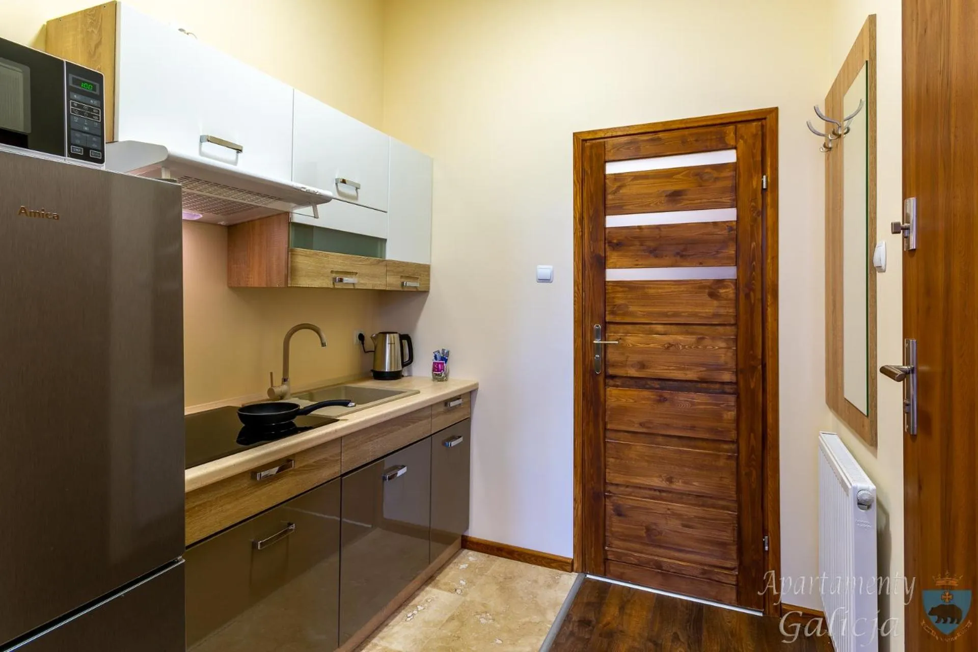 Kitchen or kitchenette in Apartamenty Galicja