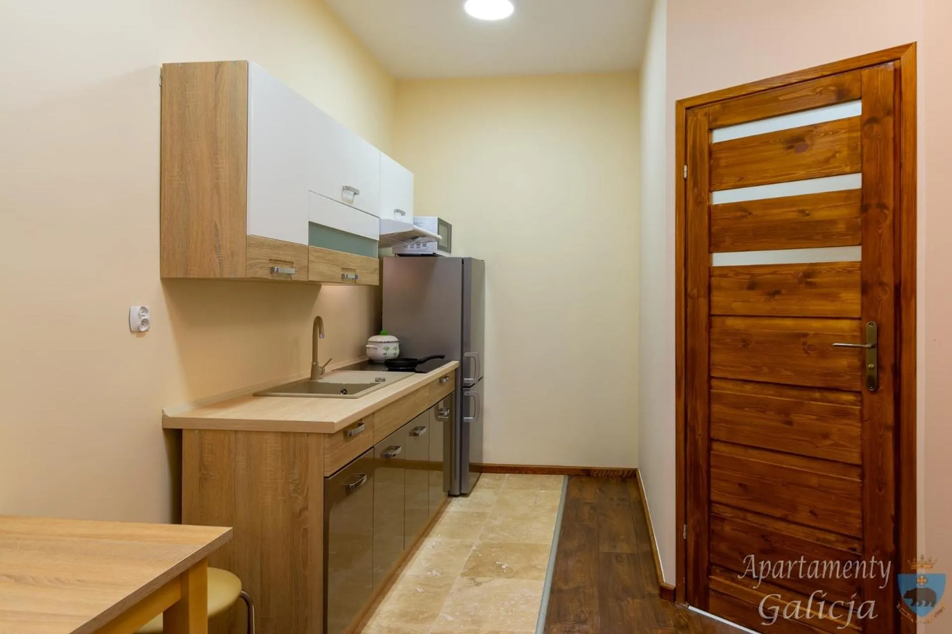 Kitchen or kitchenette in Apartamenty Galicja