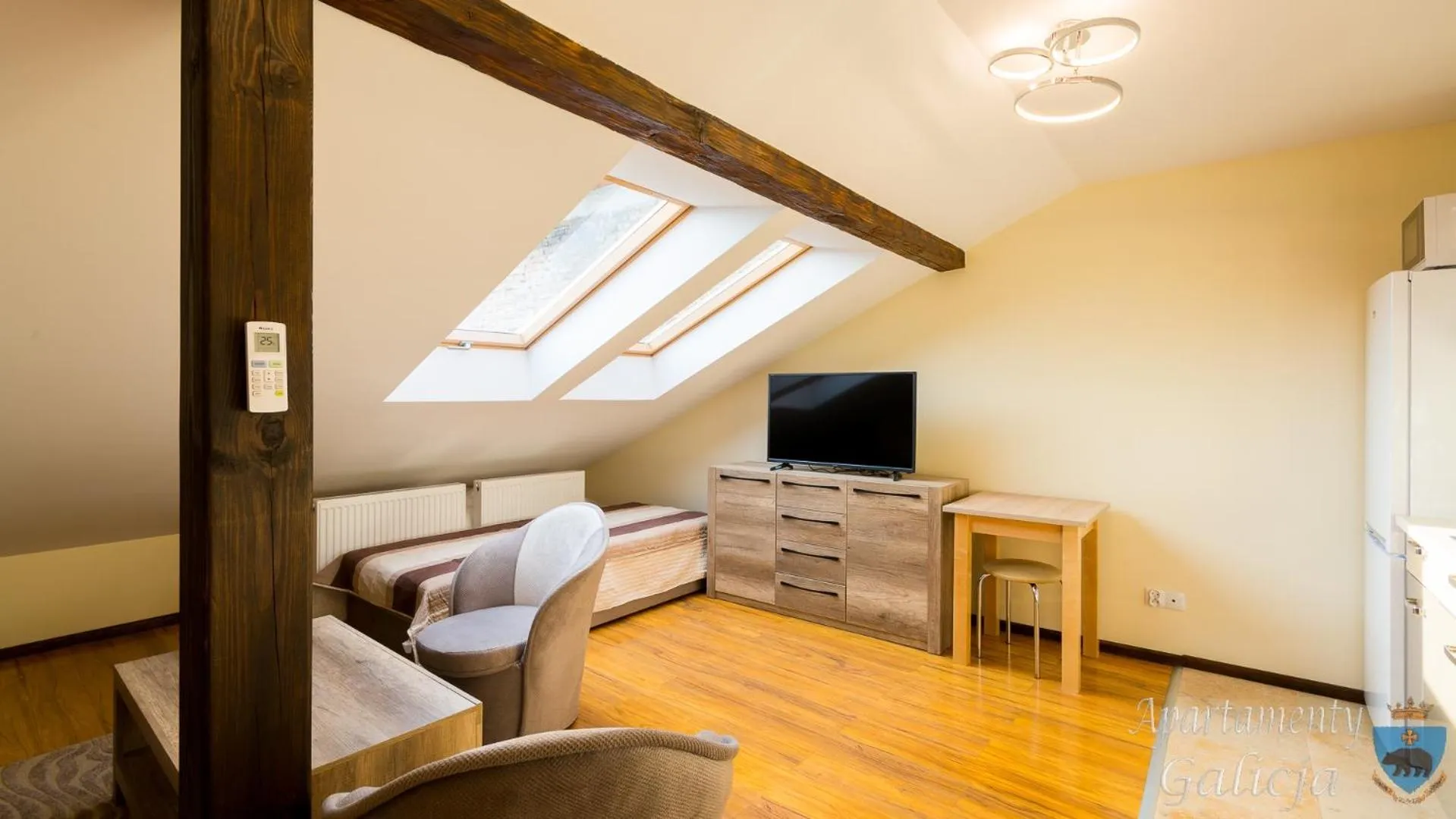 Living room, Bed in Apartamenty Galicja