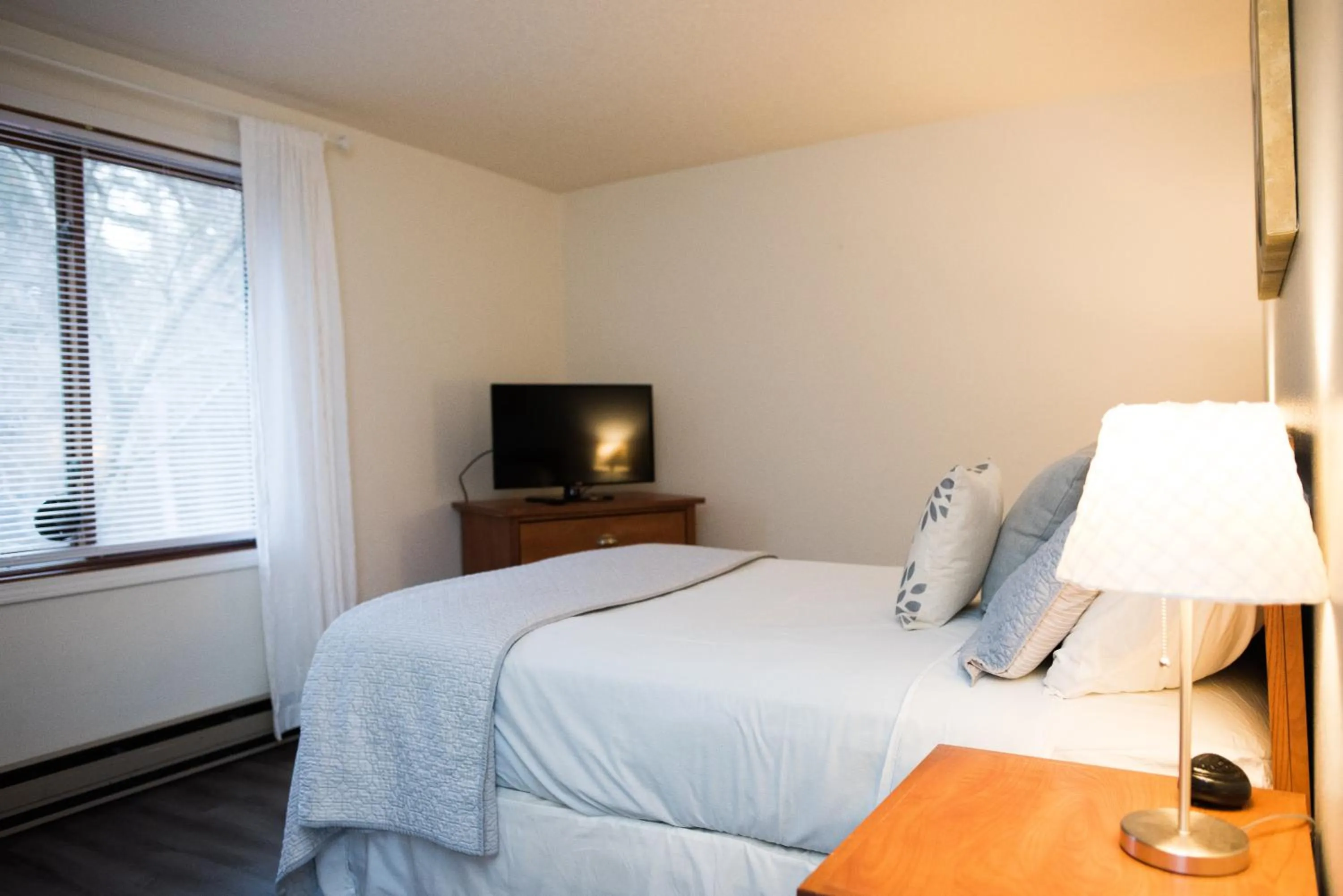 Bed in Caribbean Club Resort