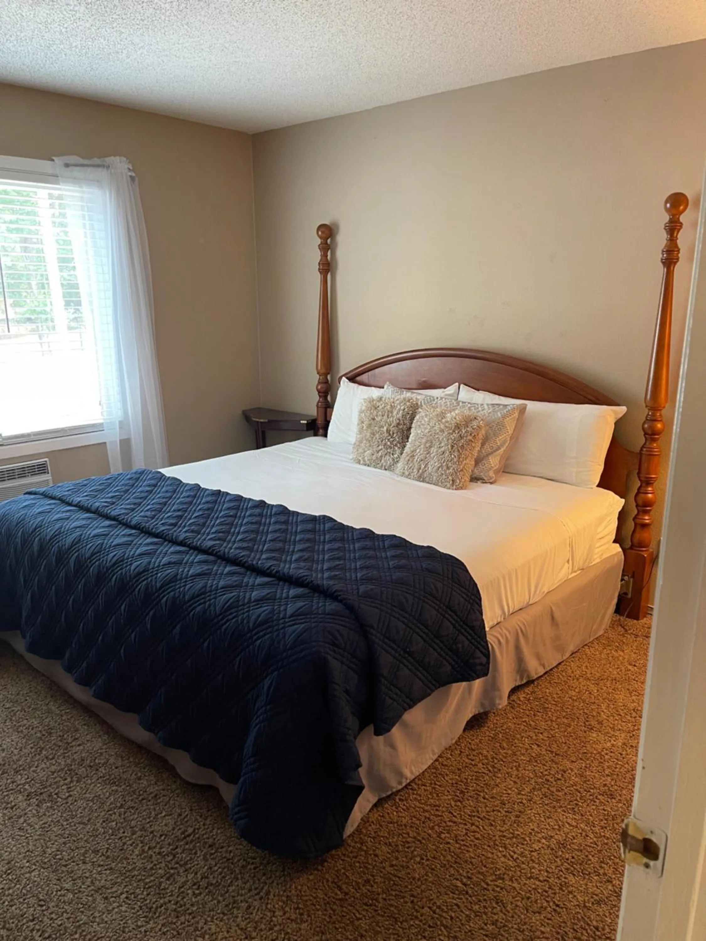 Bed in Caribbean Club Resort