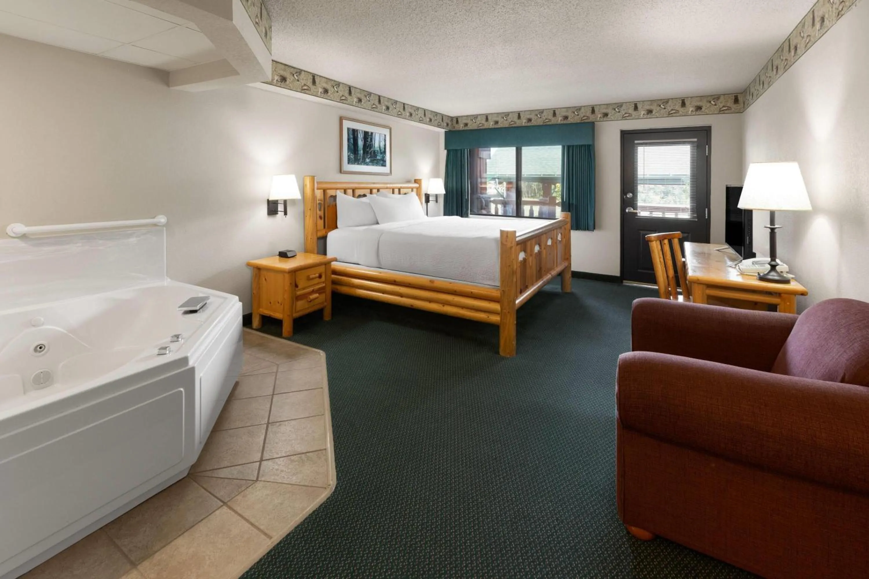 Bath, Bed in Shell Lake Lodge, a Travelodge by Wyndham