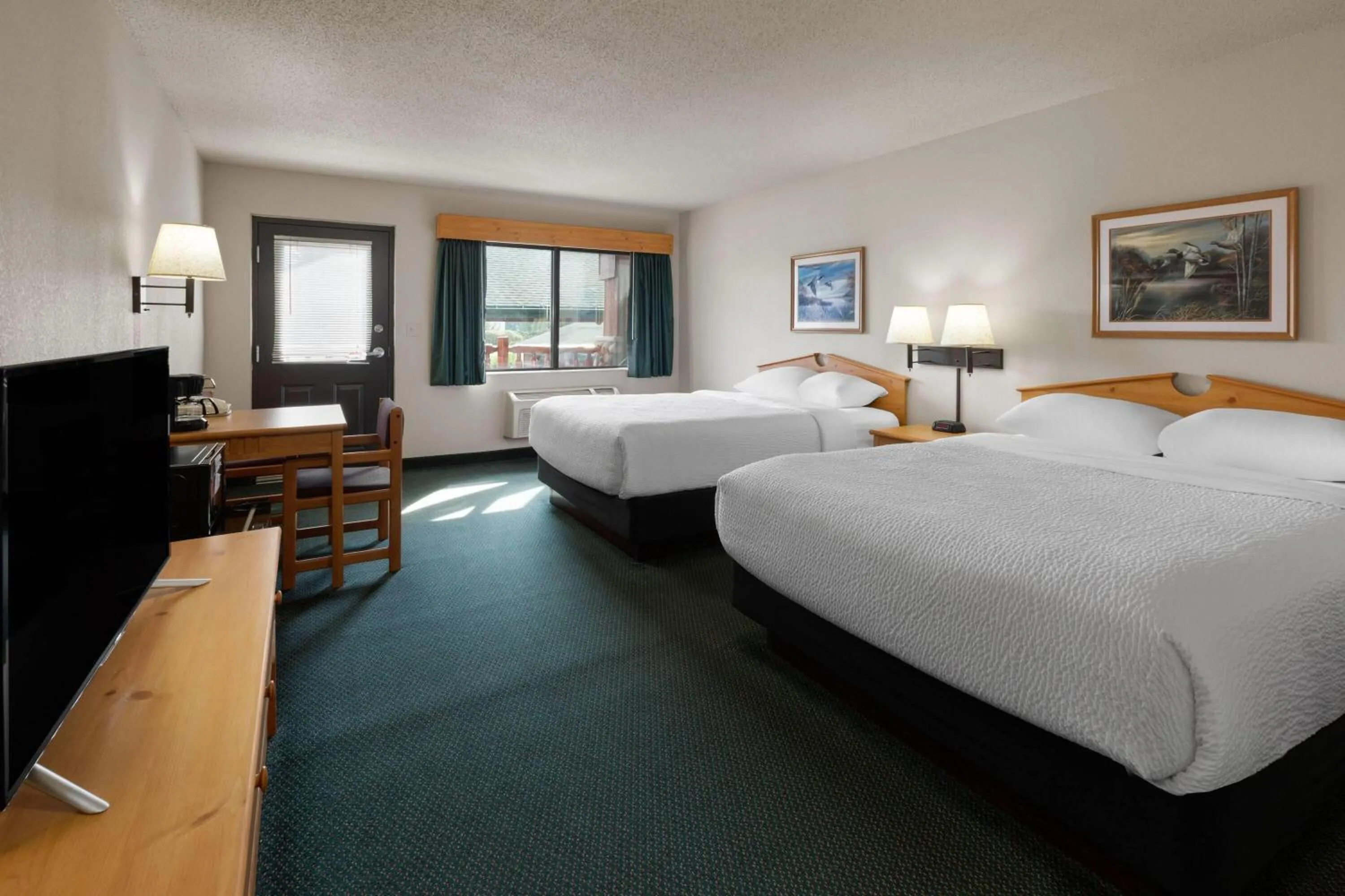 Photo of the whole room, Bed in Shell Lake Lodge, a Travelodge by Wyndham