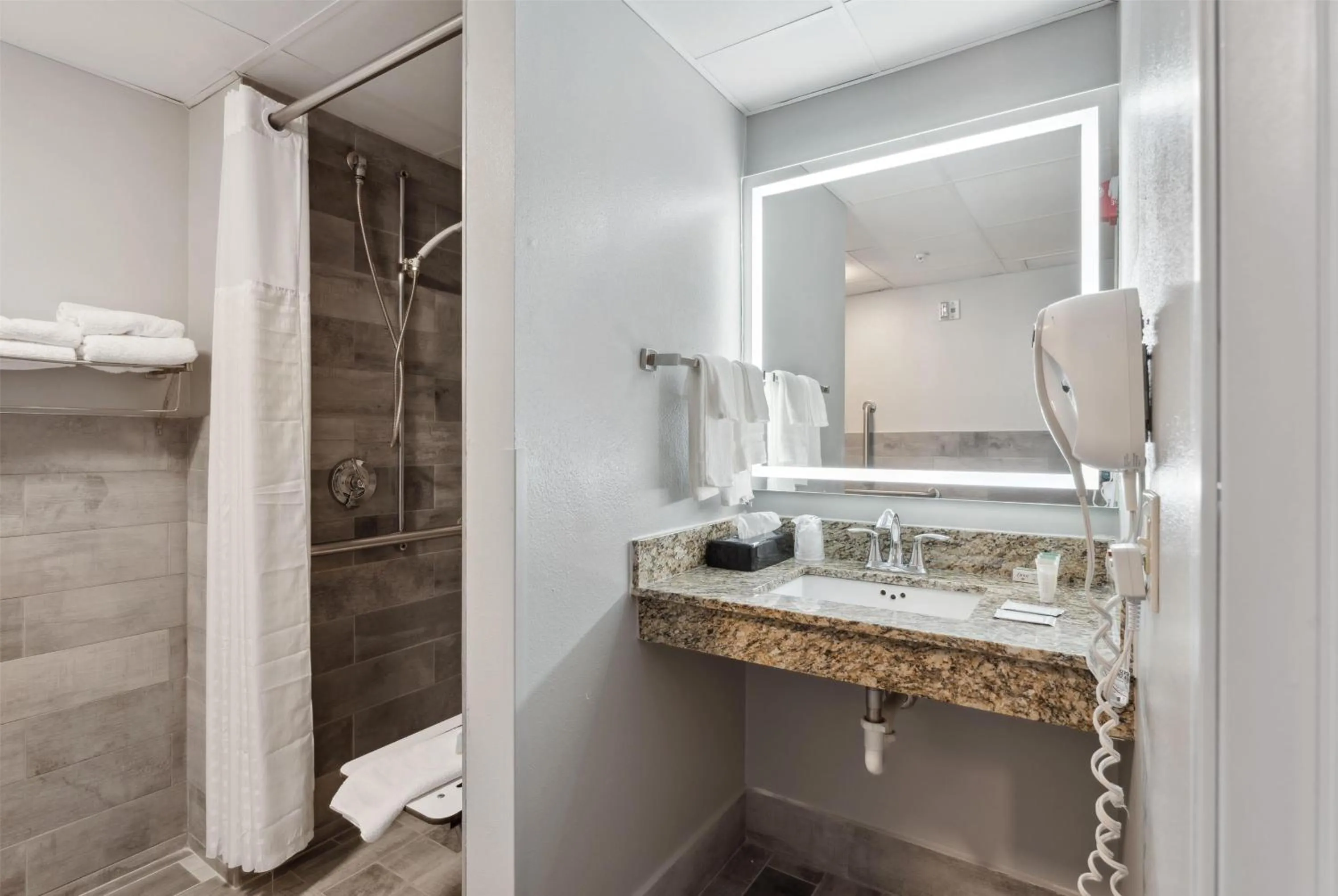 Bathroom in AmericInn by Wyndham Wisconsin Dells