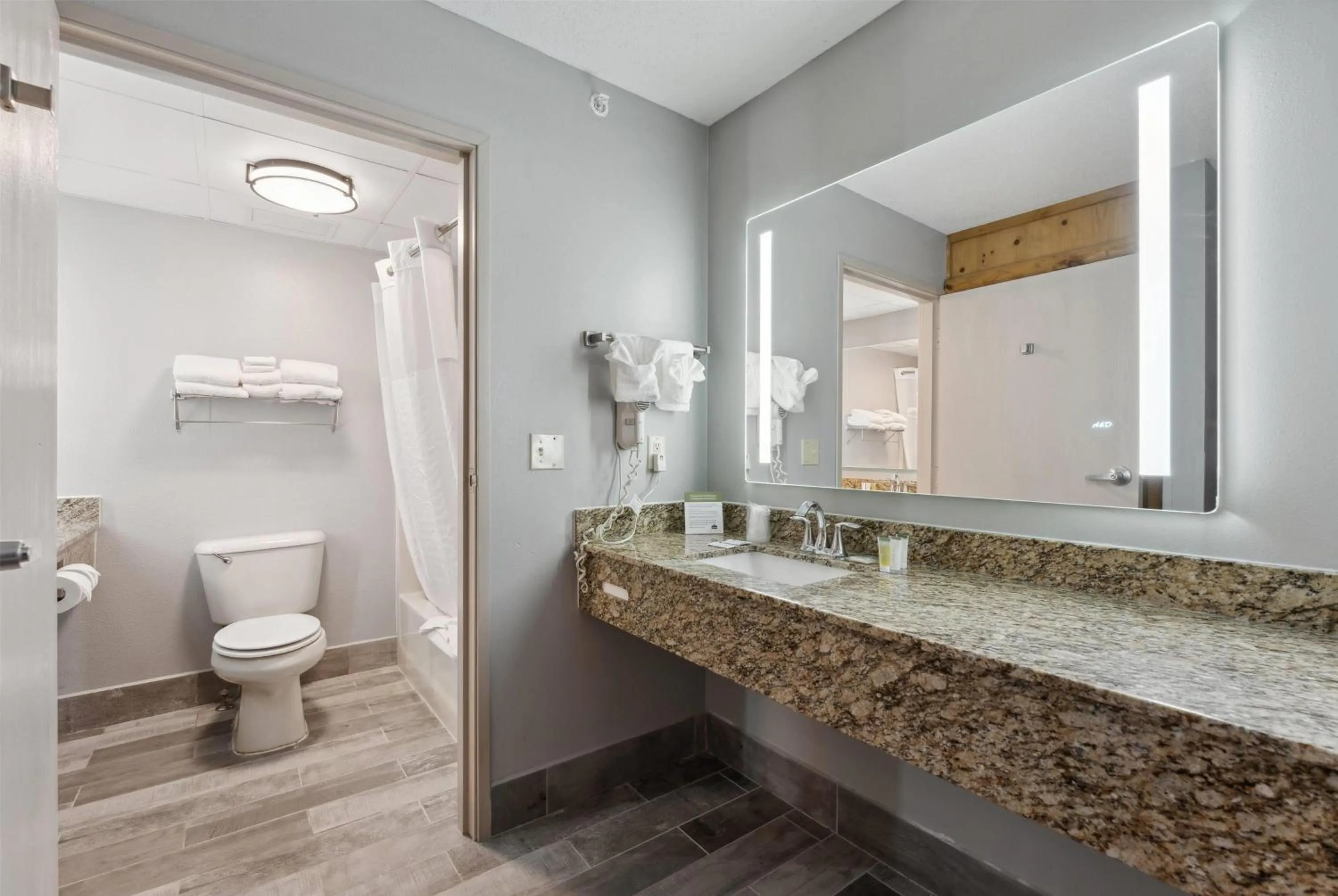 Bathroom in AmericInn by Wyndham Wisconsin Dells