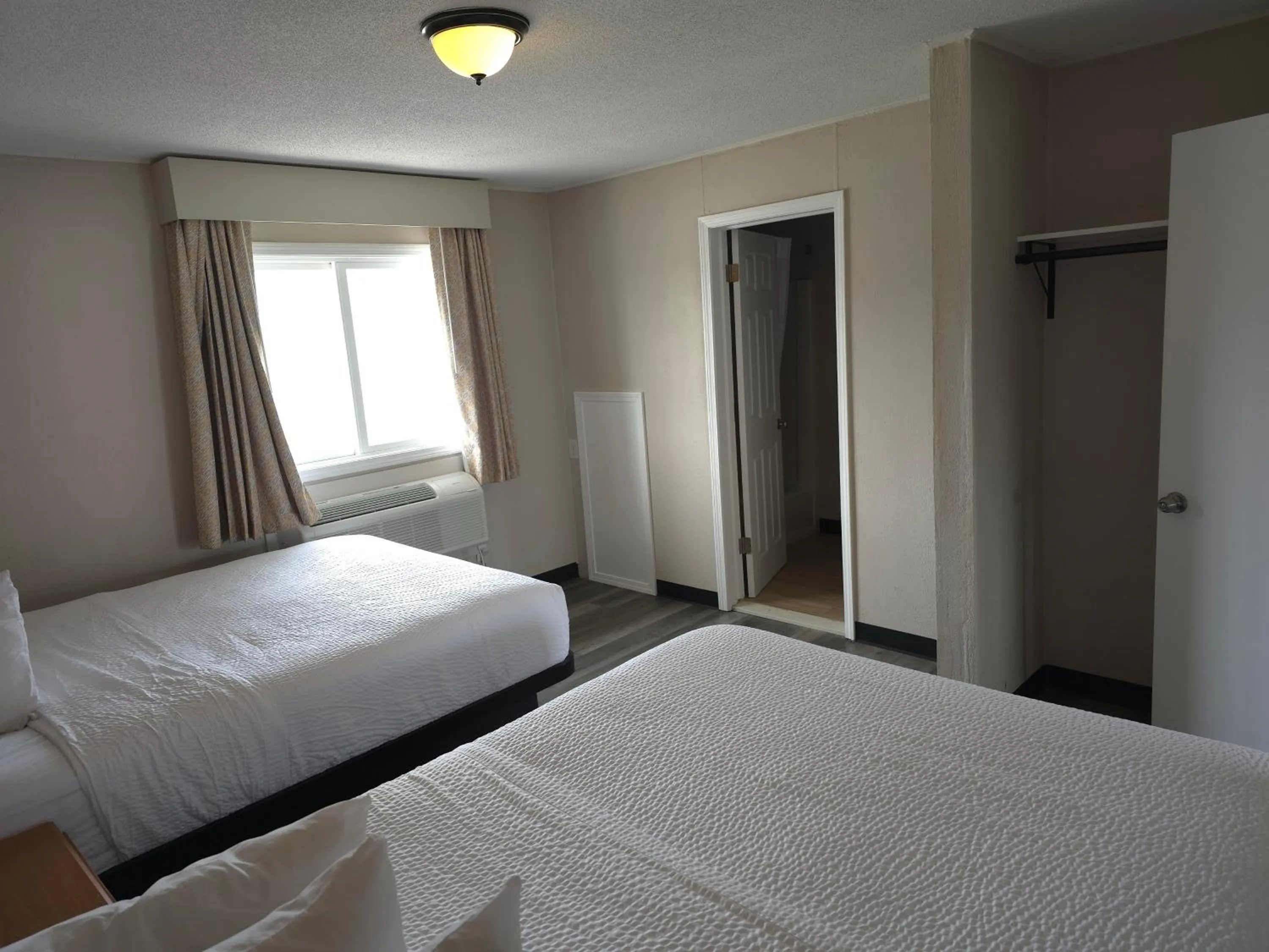 Bed in Days Inn and Suites by Wyndham Port Huron