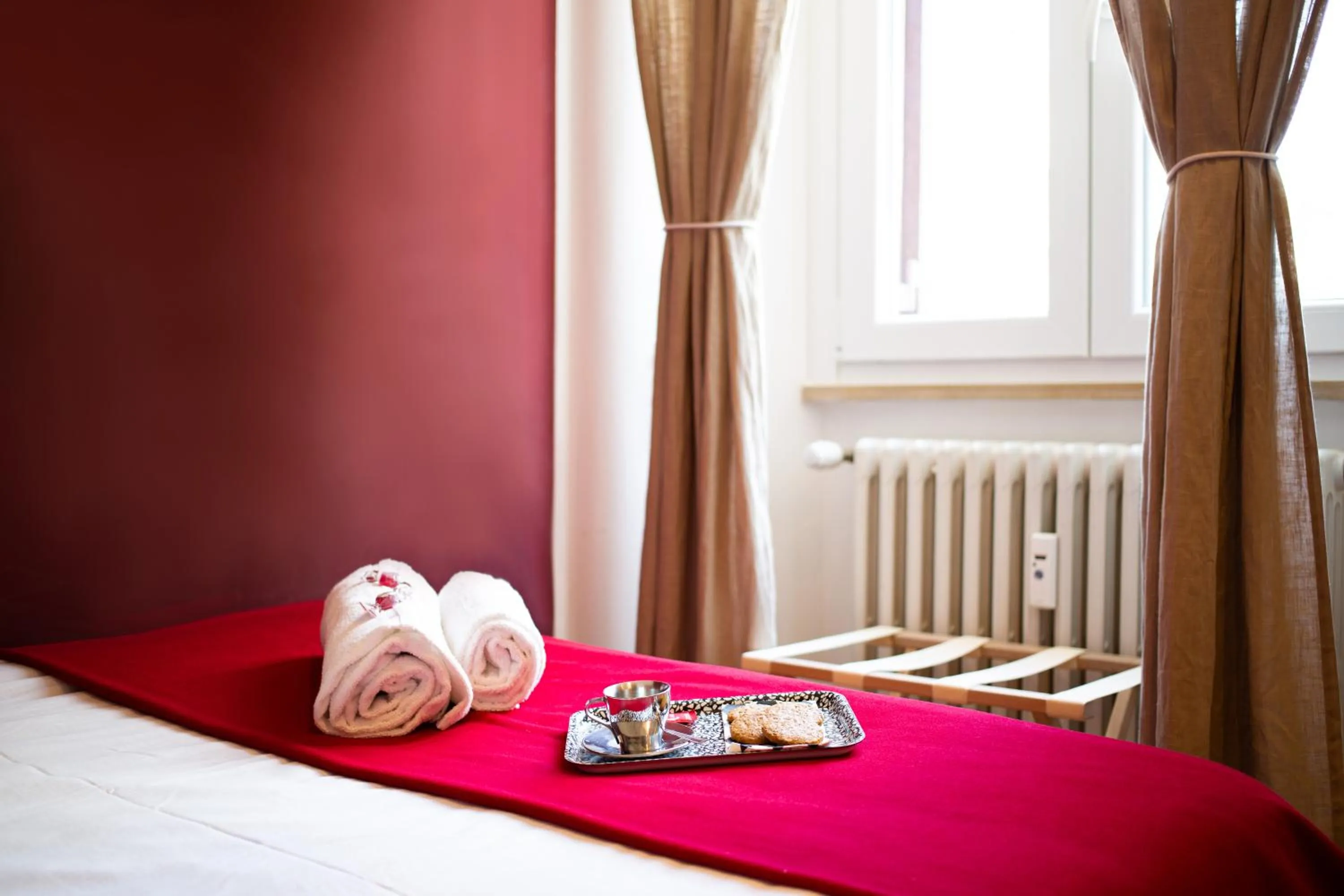 Bed in Lombardia40 Luxury Suites