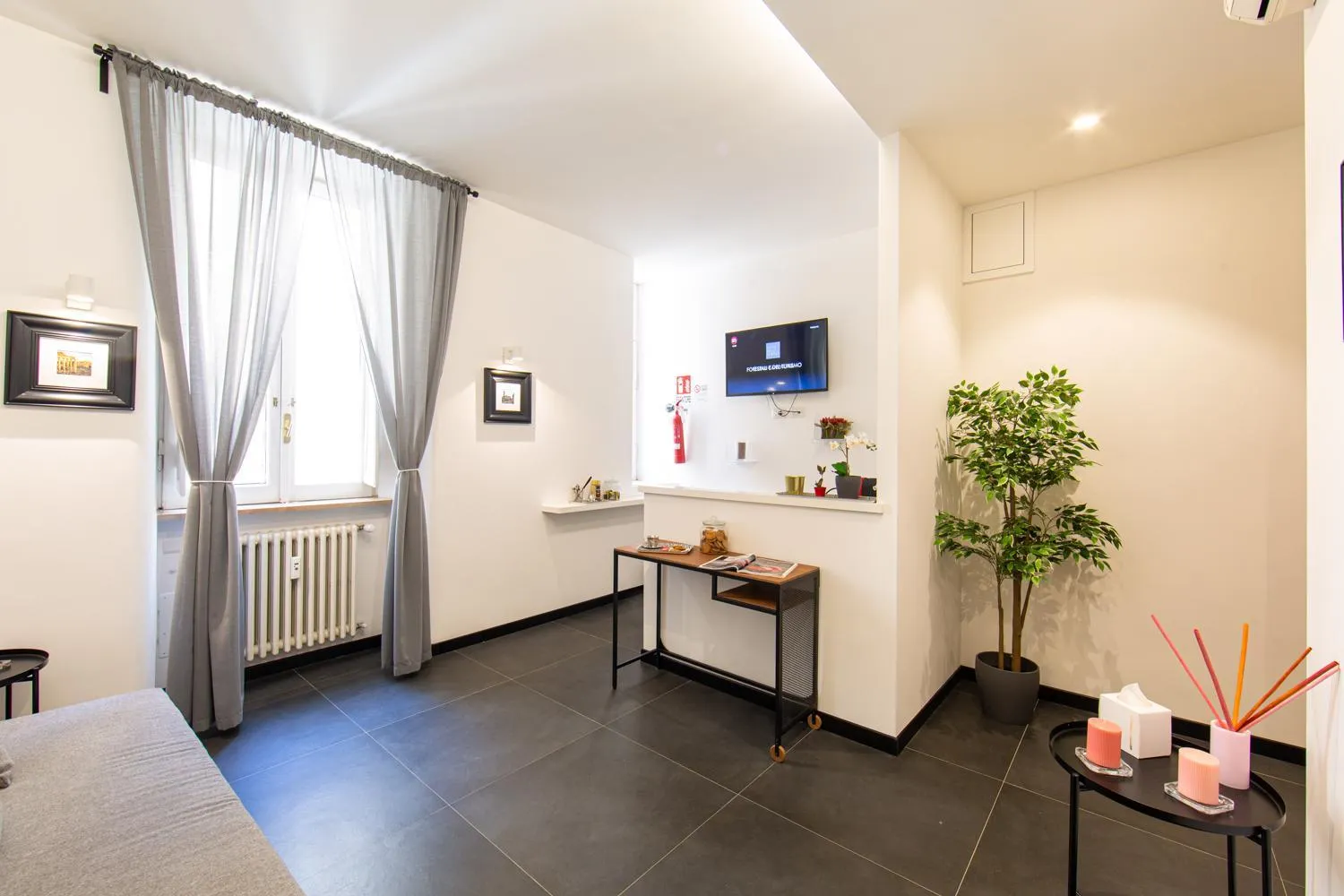 Communal lounge/ TV room in Lombardia40 Luxury Suites