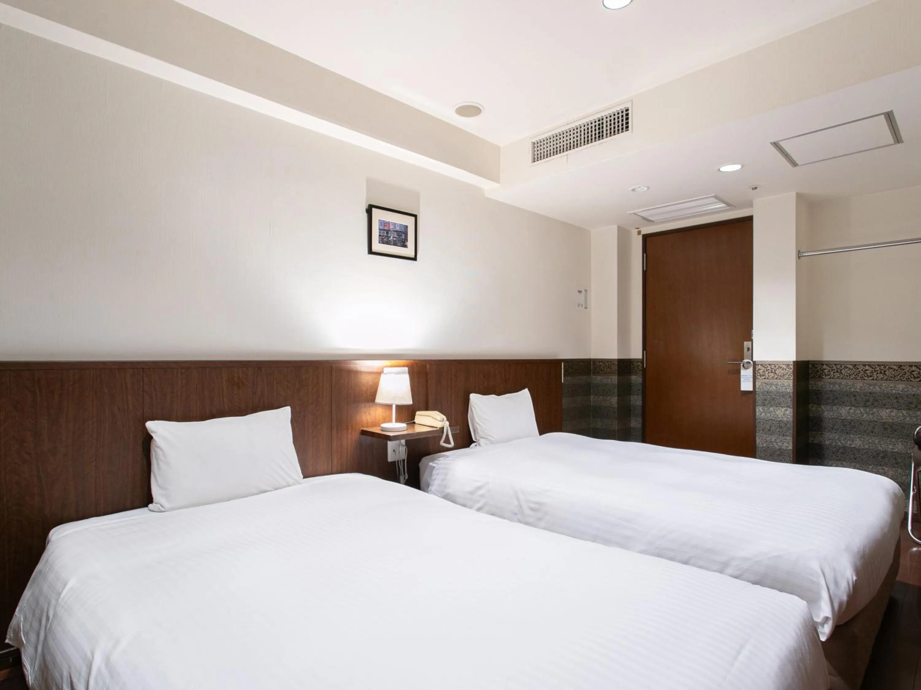 Photo of the whole room, Bed in Sutton Hotel Hakata City