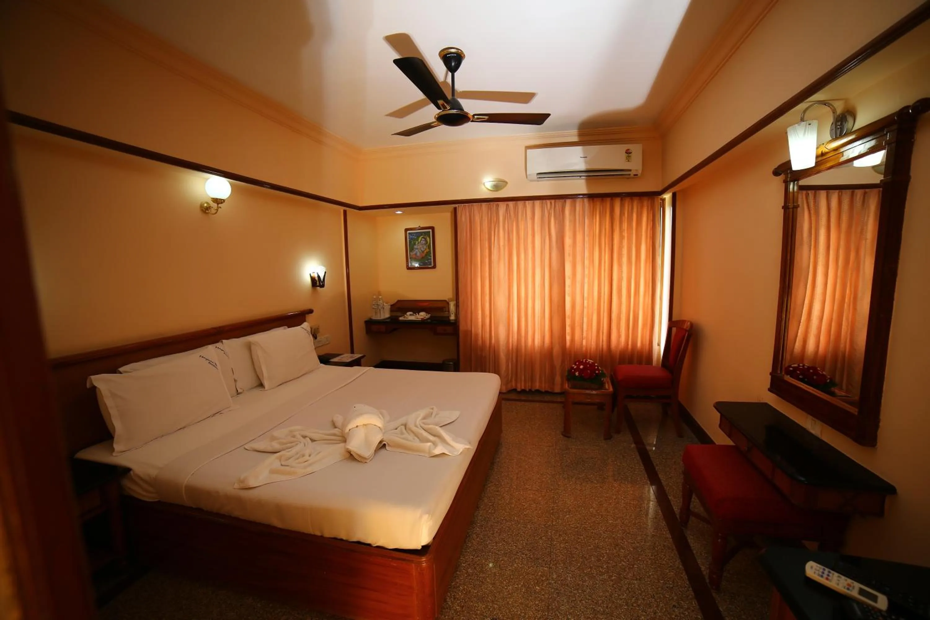 Photo of the whole room, Bed in Mayura Residency