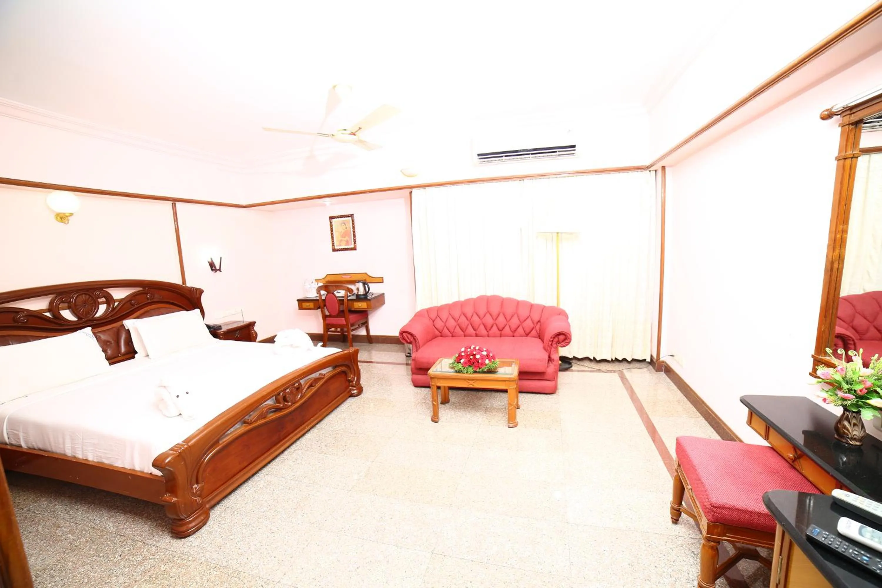 Photo of the whole room, Bed in Mayura Residency
